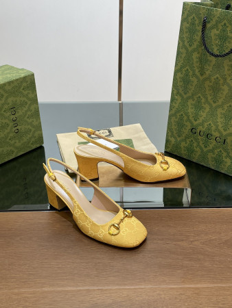 ua G*u*i women's horsebit slingback