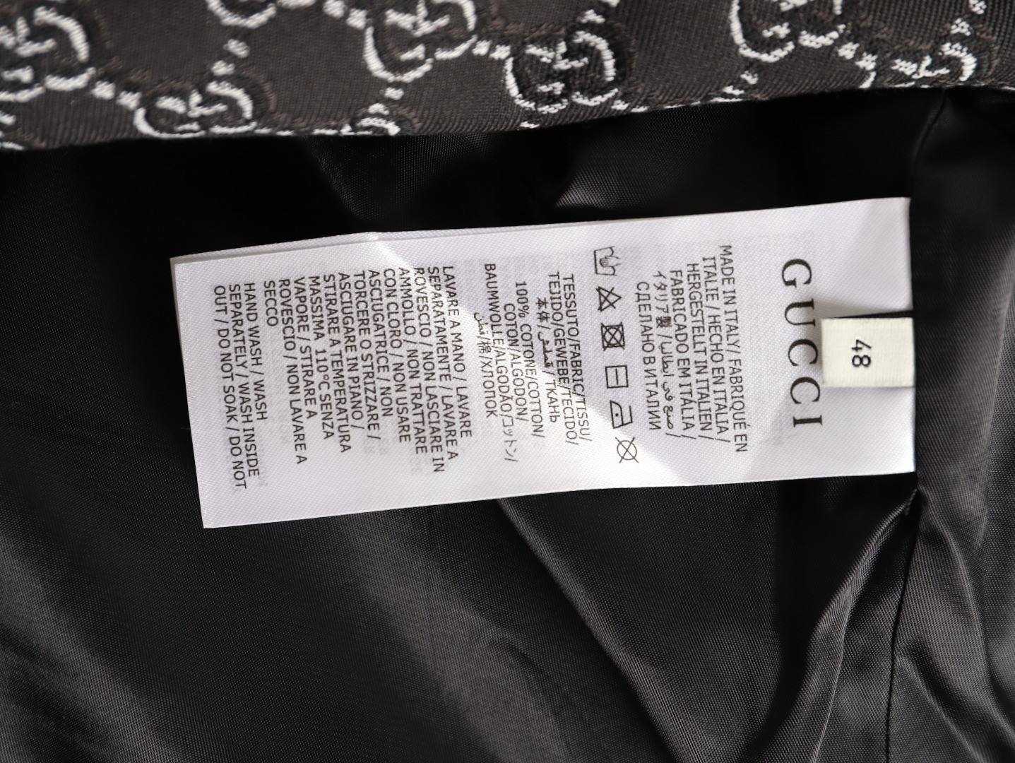 G*u*i coats