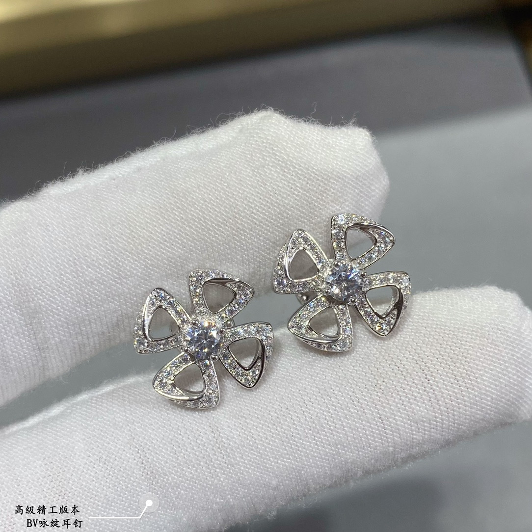 B*l*ai earrings
