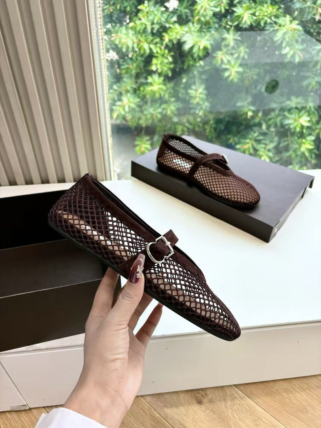 UA ALAÏA BALLET FLATS IN FISHNET