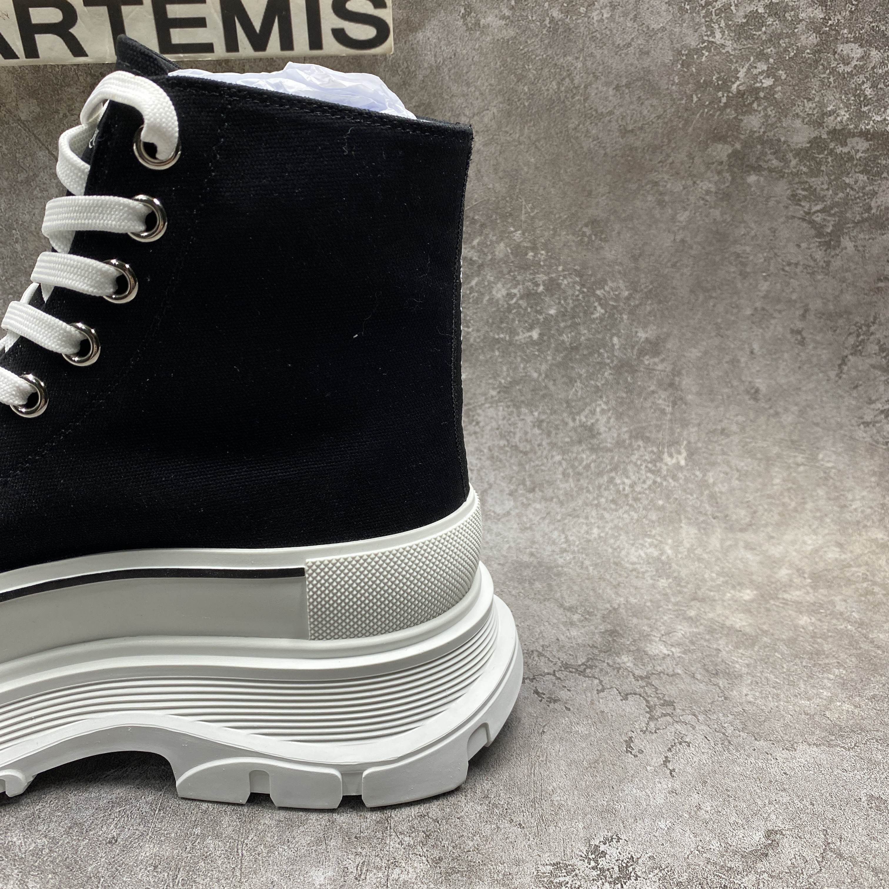 ale*d*r M*Q*en tread slick high lace up boot black white