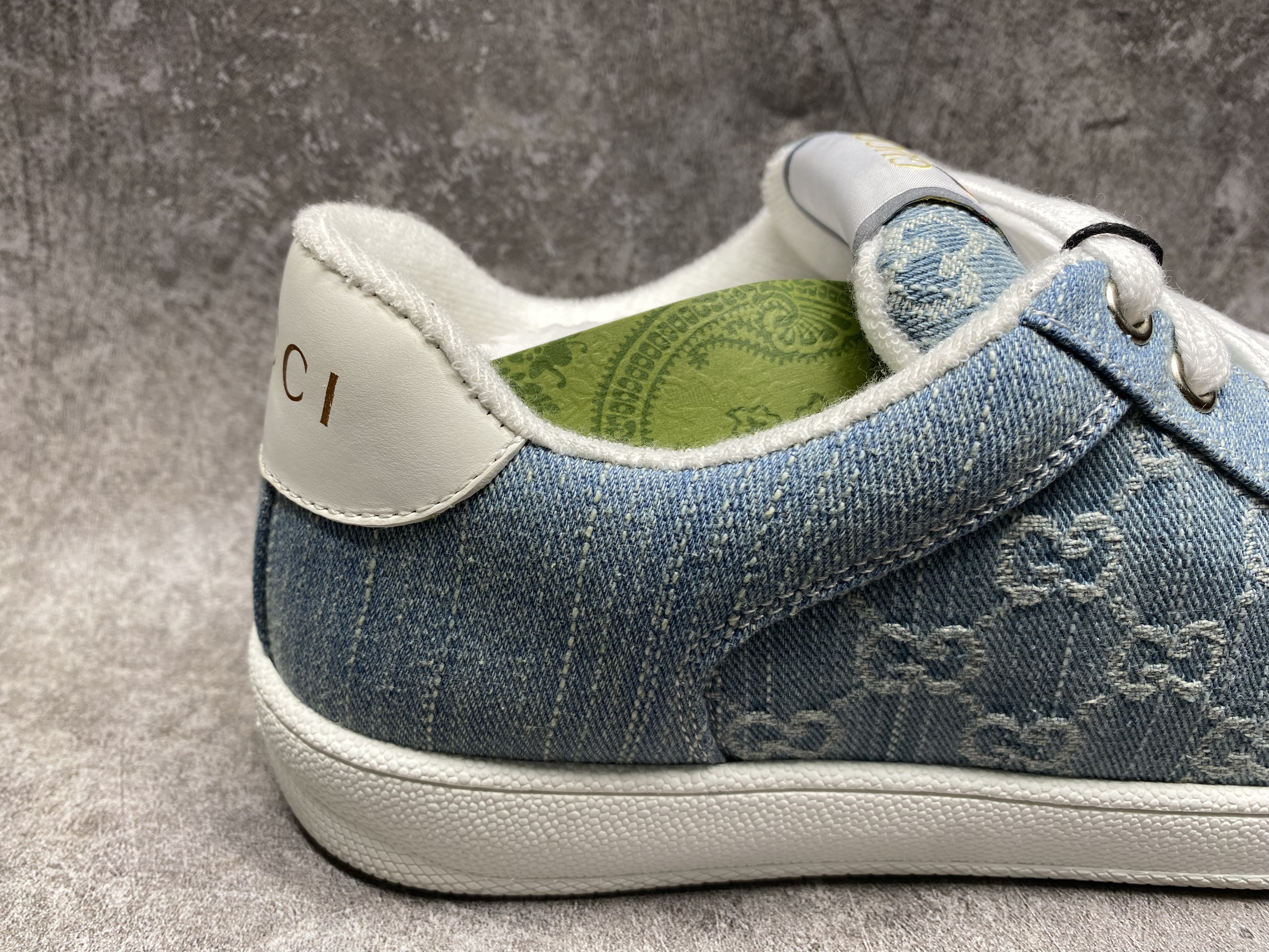ua G*u*i sneakers