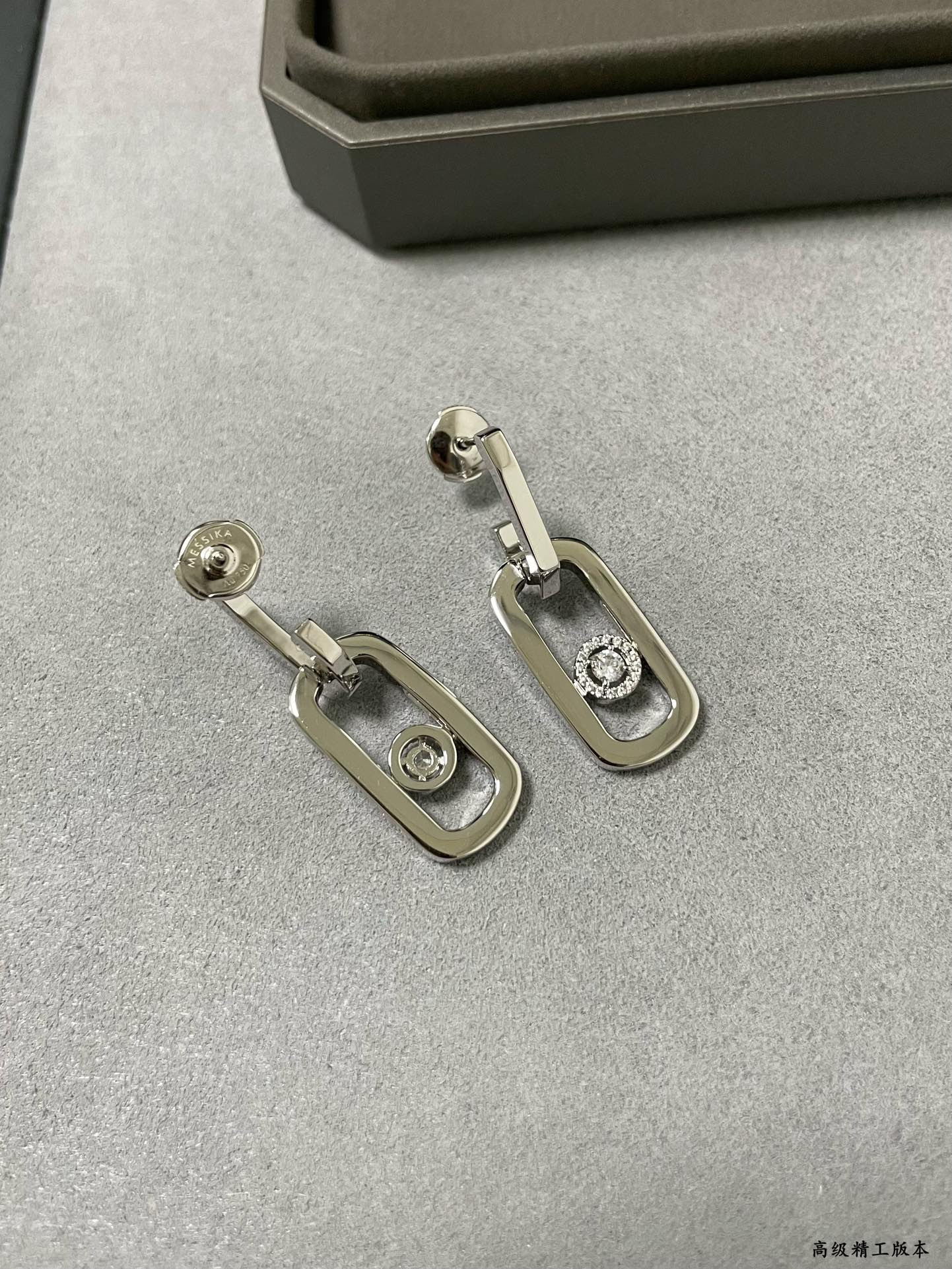 messika large single Di*m*nd moving stud earrings