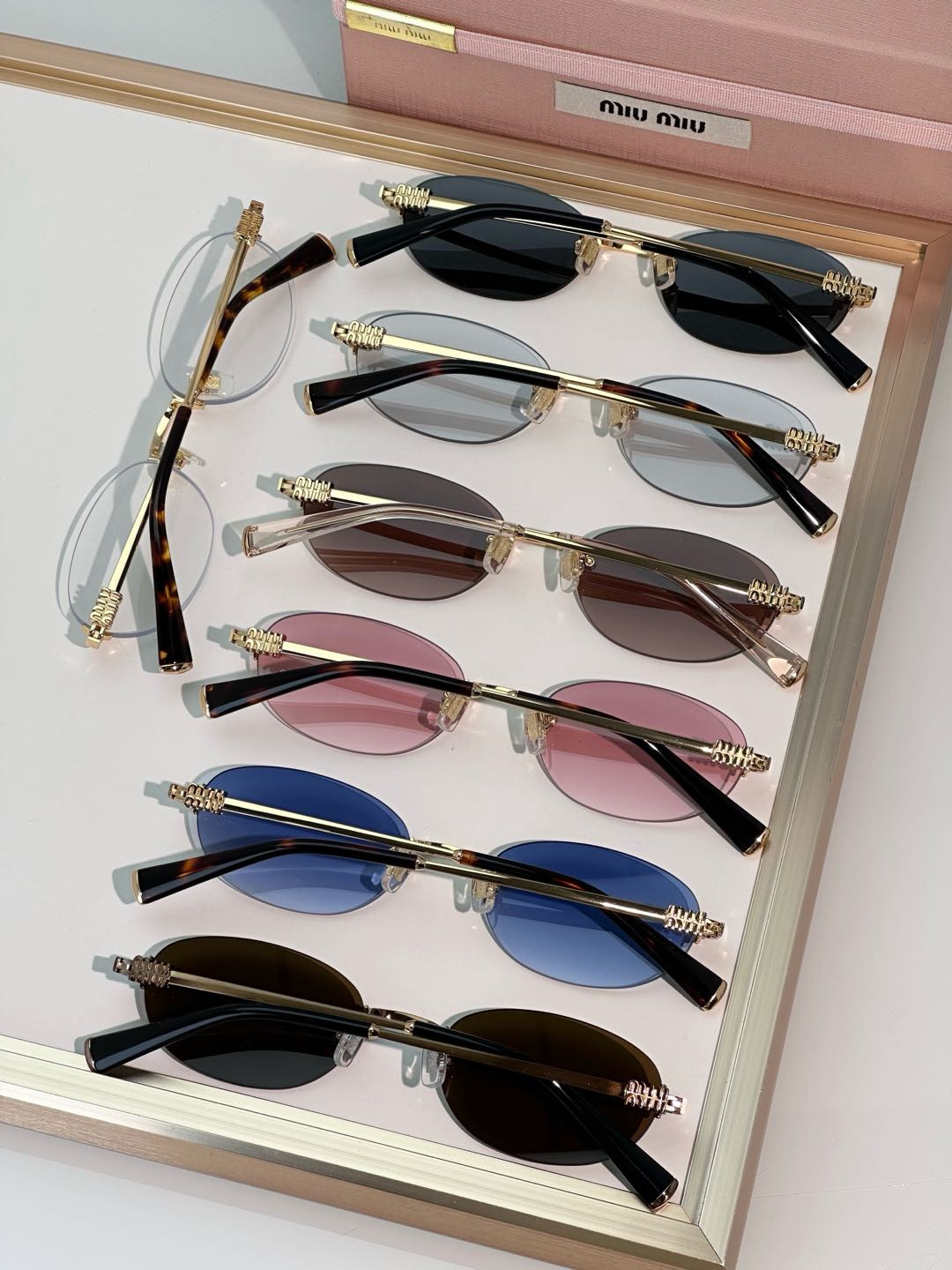 Miu Miu Glasses SMUA54 53-20-140