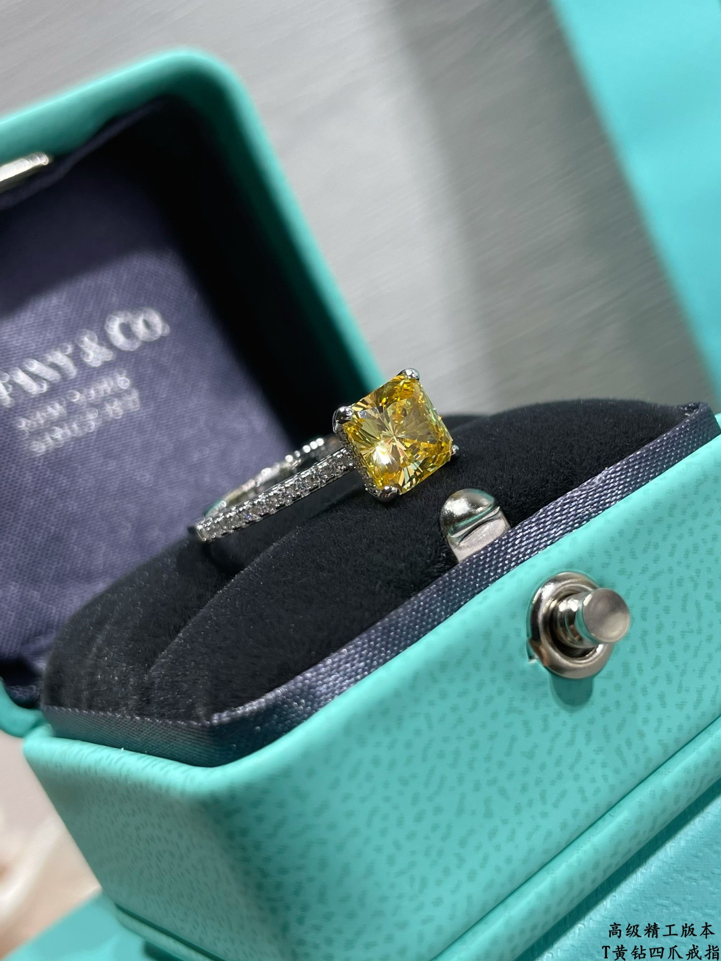 t*f*ny & co. four-prong yellow Di*m*nd solitaire ring ag925