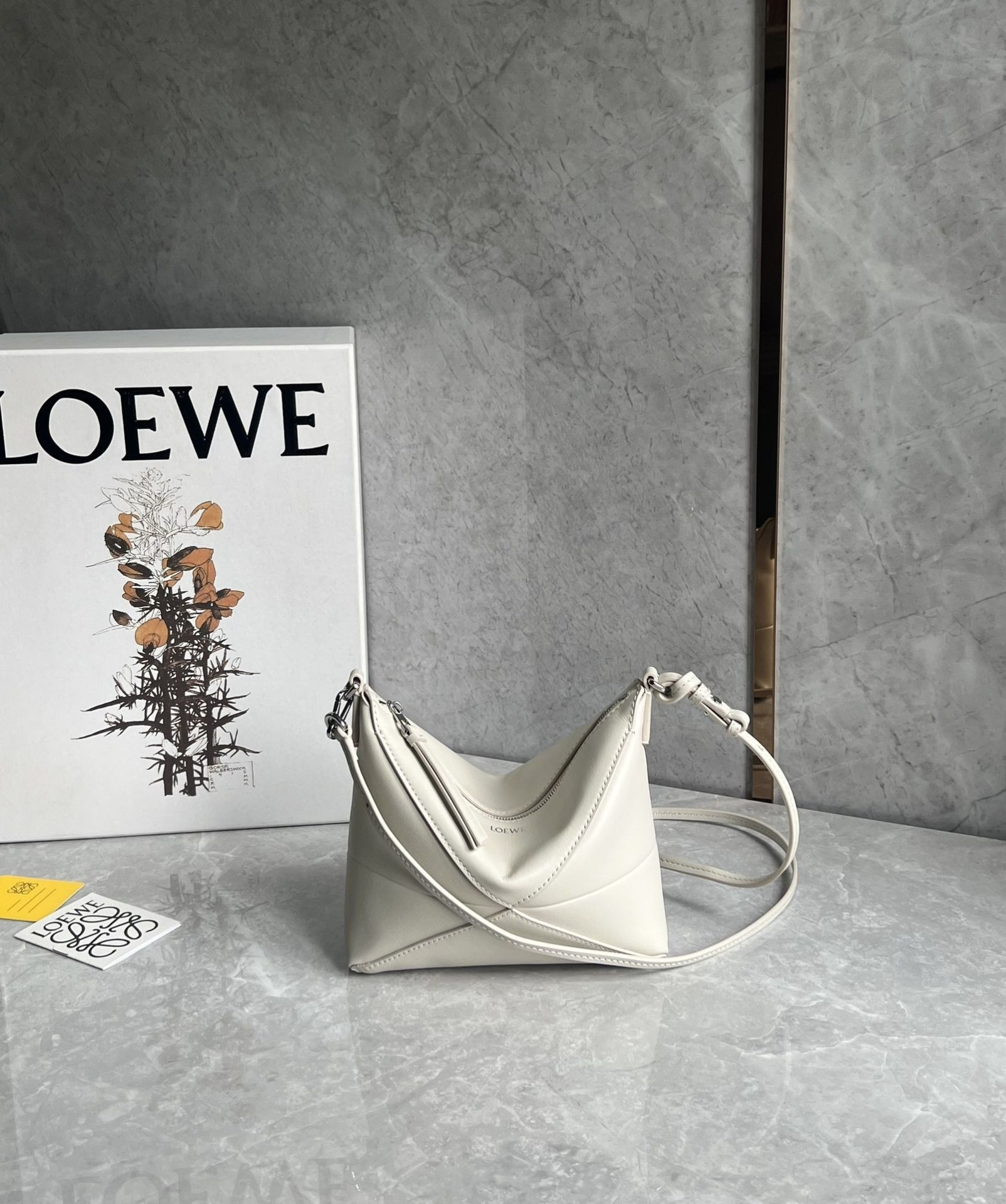 L0ew* puzzle fold pouch in shiny nappa calfskin 15.5x23x6.5cm