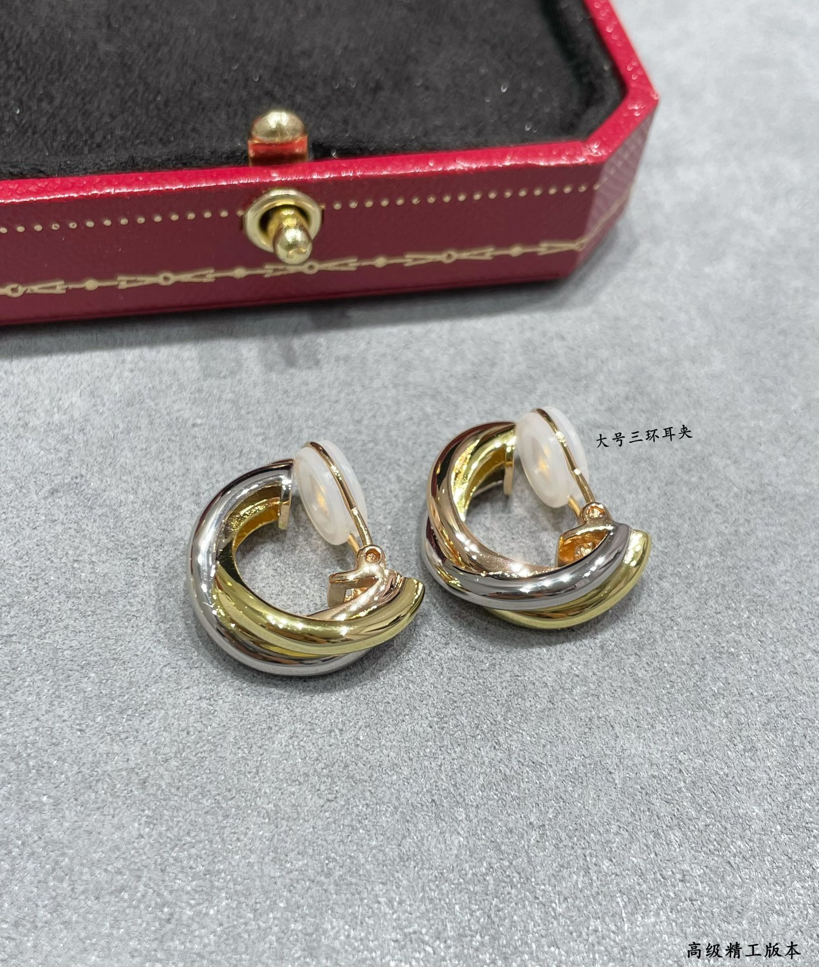 Ca*t*er large three-hand earrings