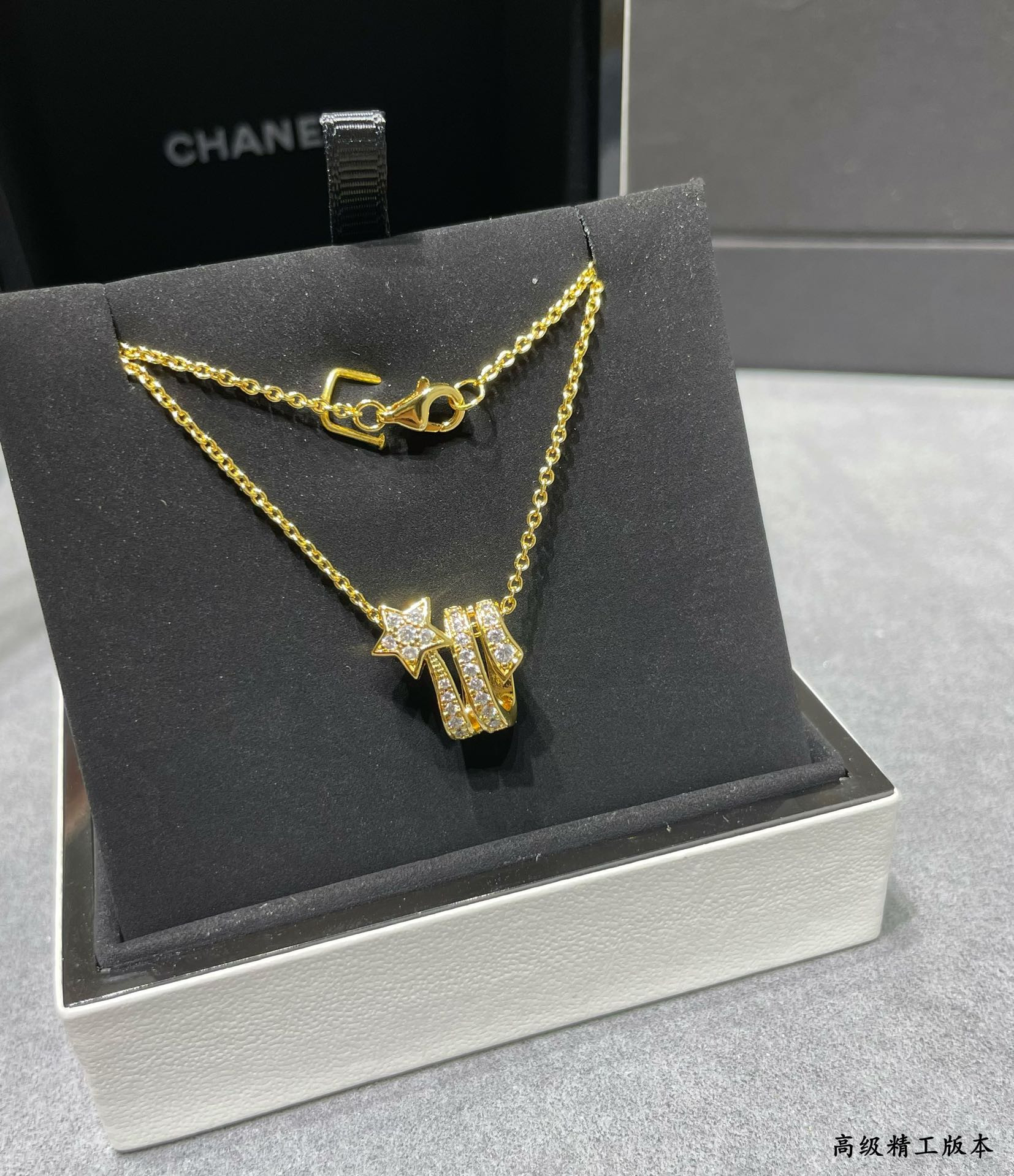 Ch*el comet necklace