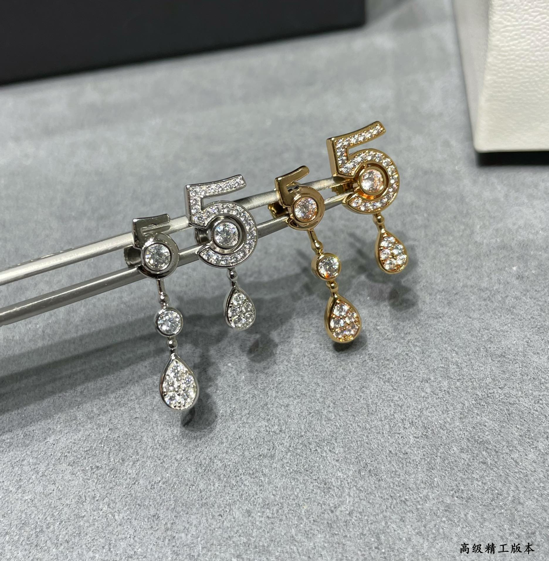 Ch*el 5-word earrings