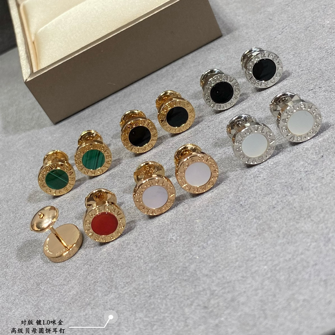 B*l*ai round cake earrings