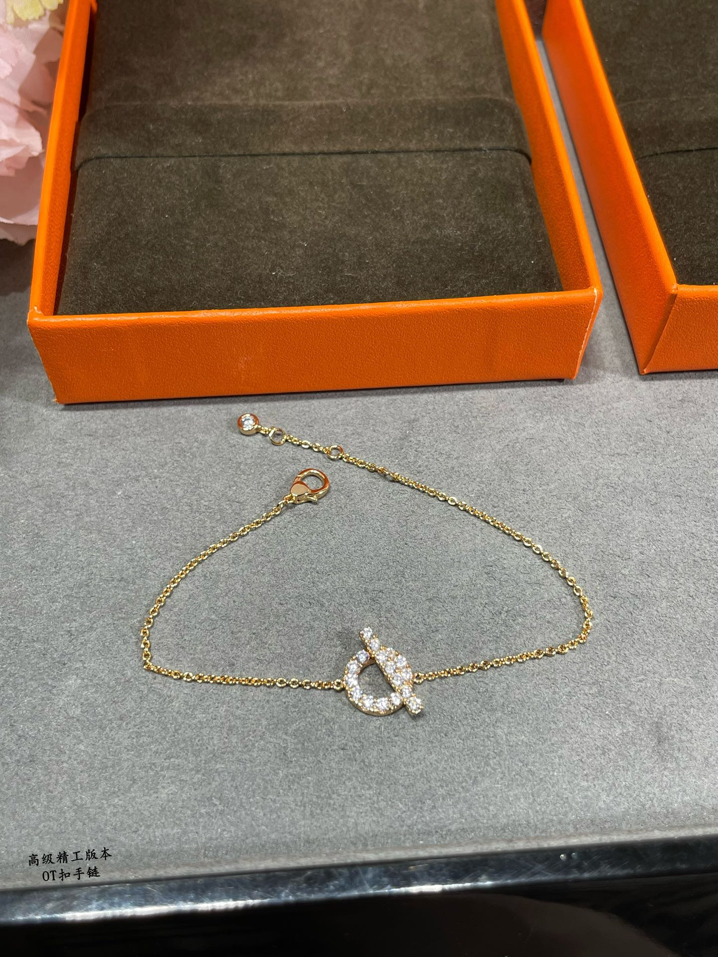 h**mes ot clasp fully Di*m*nd-encrusted bracelet