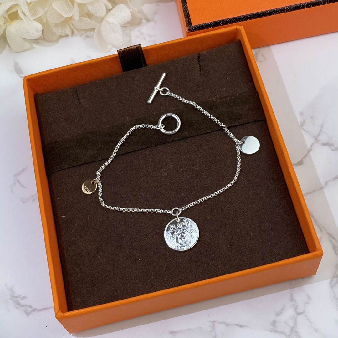 H**me5 coin bracelet