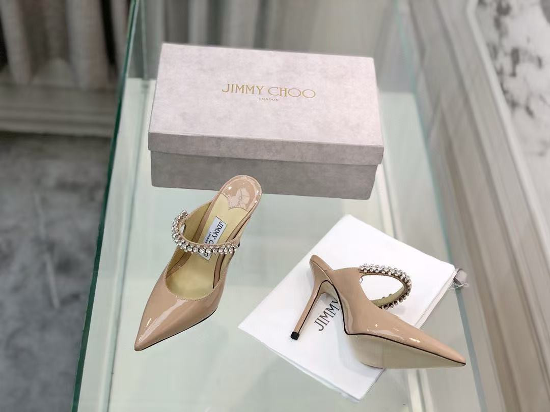 ua Ji*y Ch* mules en cuir bing