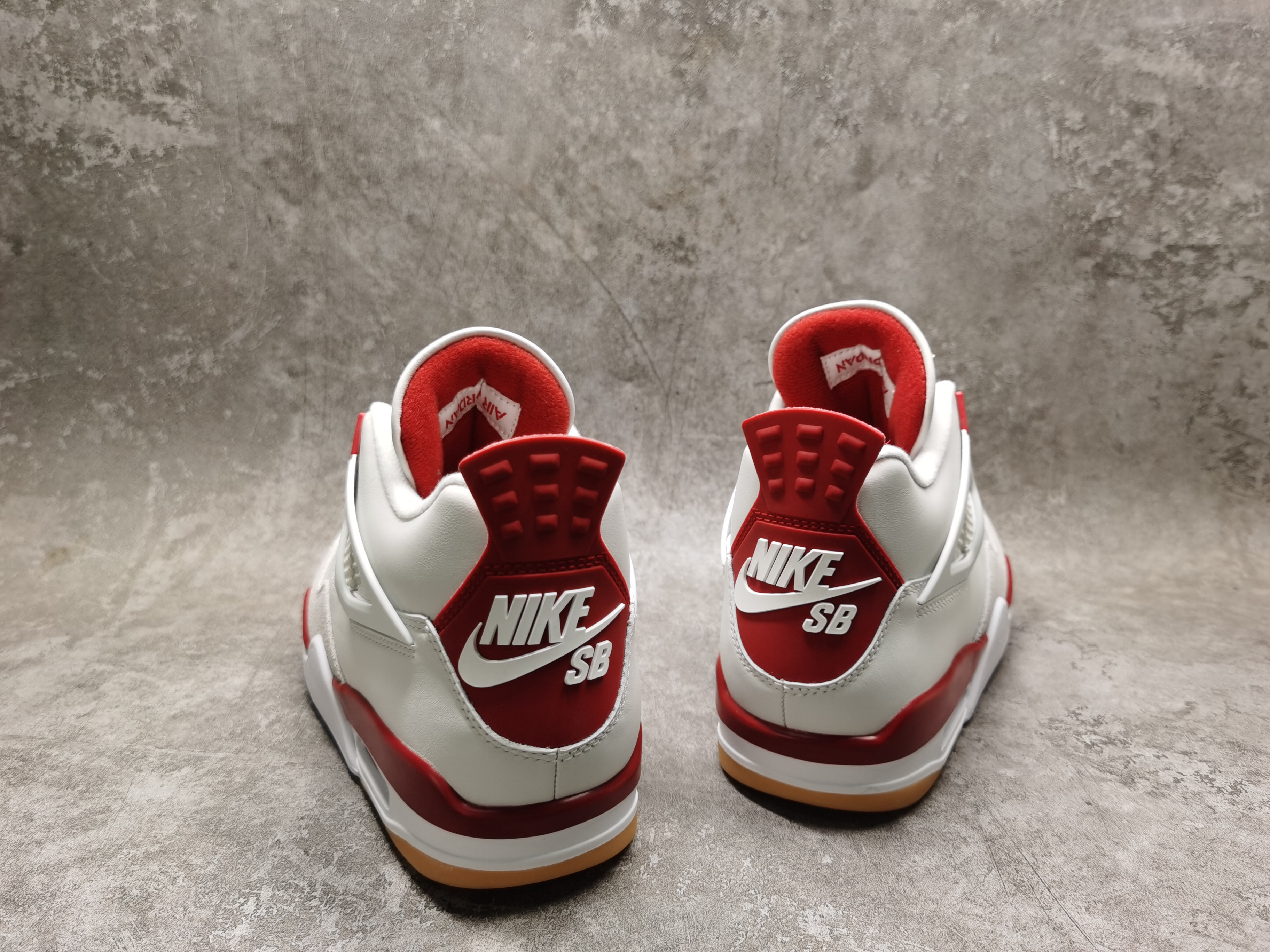 UA Jordan 4 Retro SB
