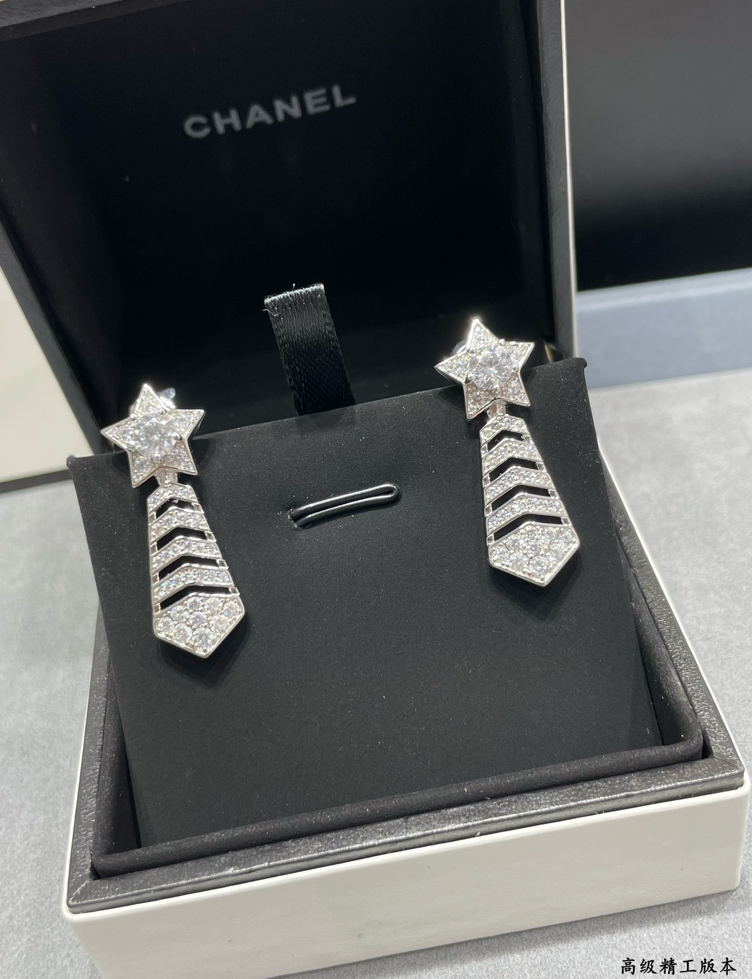 Ch*el comet earrings