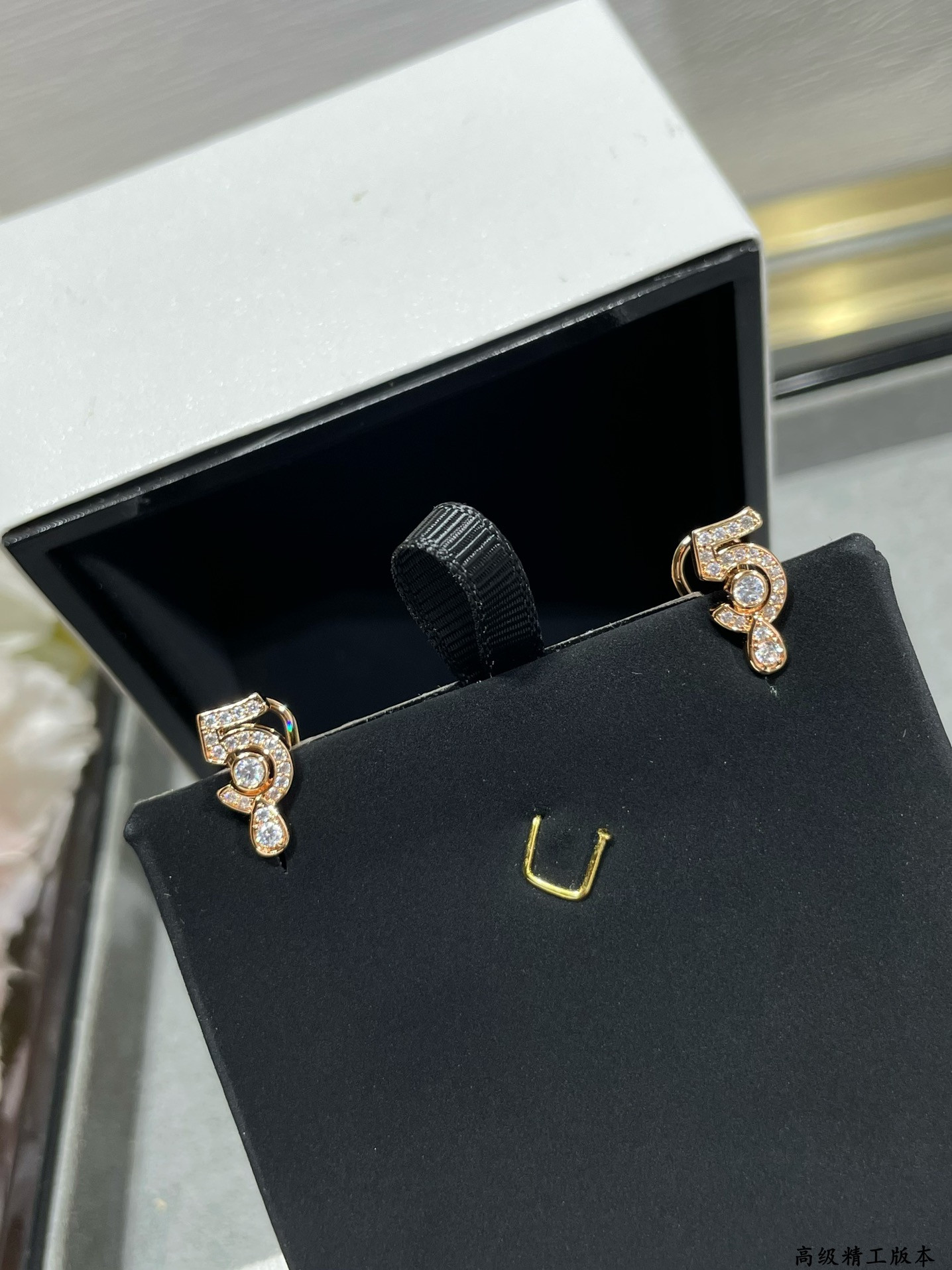 Ch*el 5-word earrings