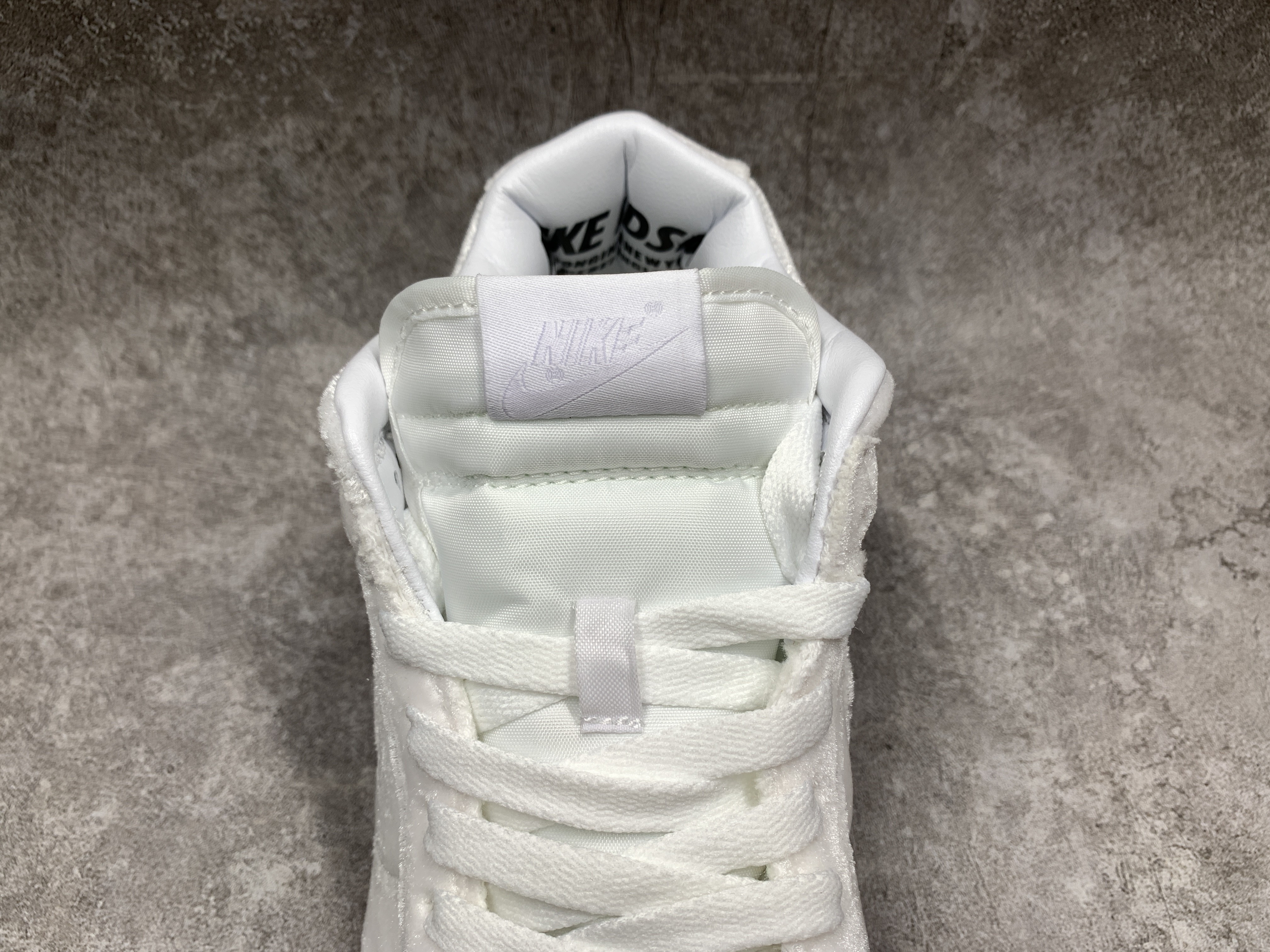 Nike Dunk Low Triple White x Dover Street Market