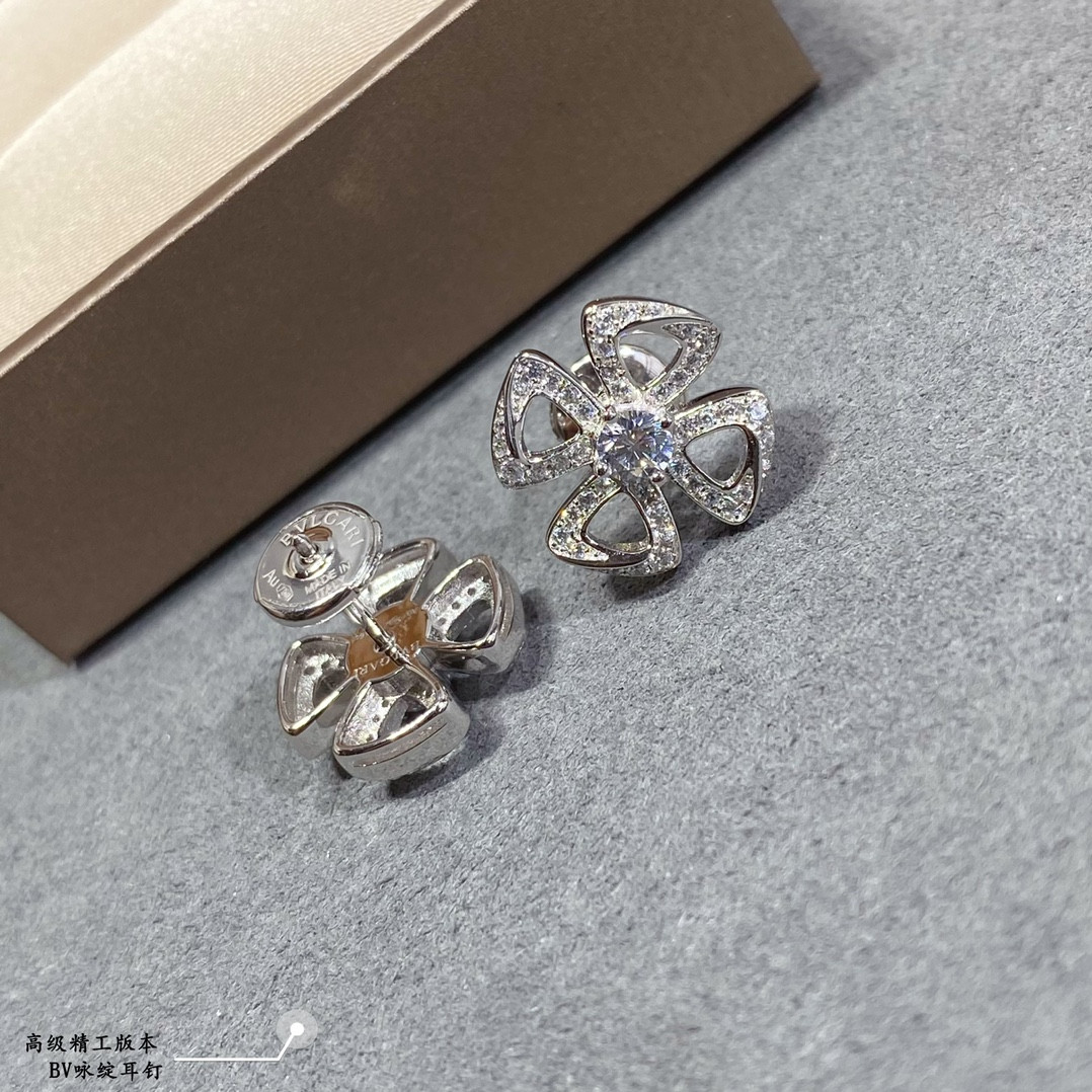 B*l*ai earrings