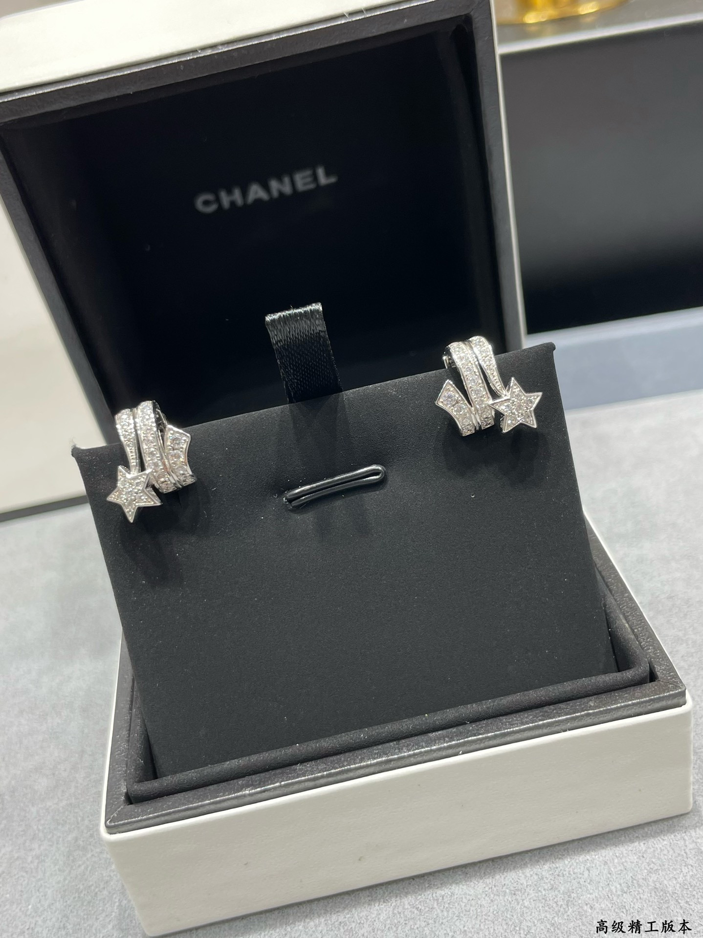 Ch*el comet earrings