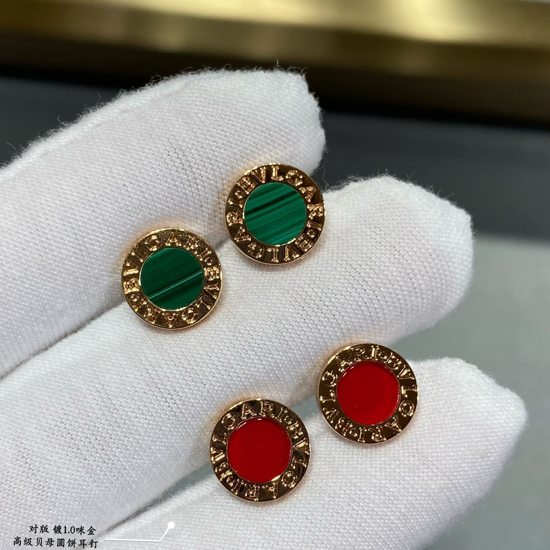 B*l*ai round cake earrings