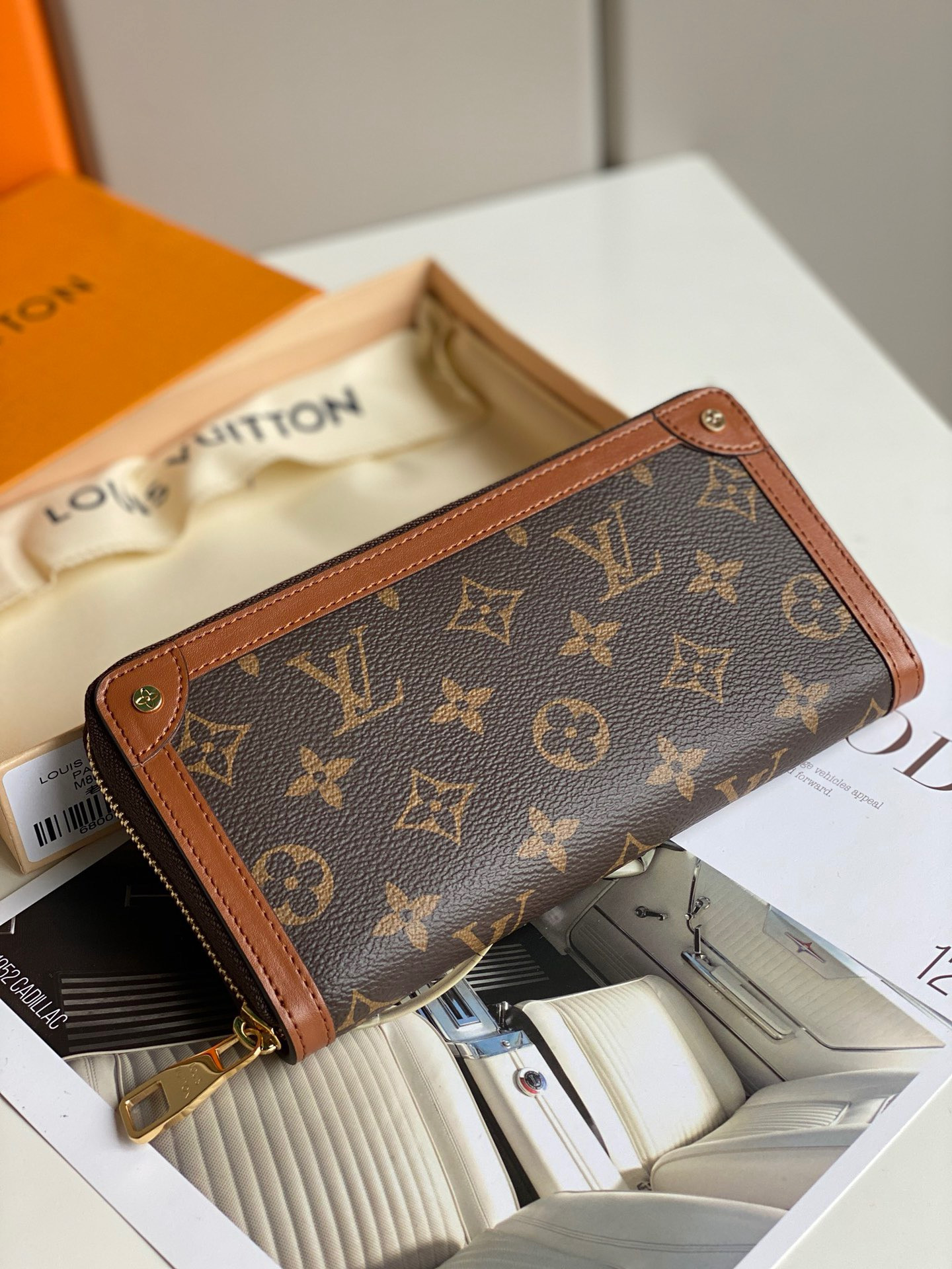 LV ZIPPY WALLET TRUNK M80558