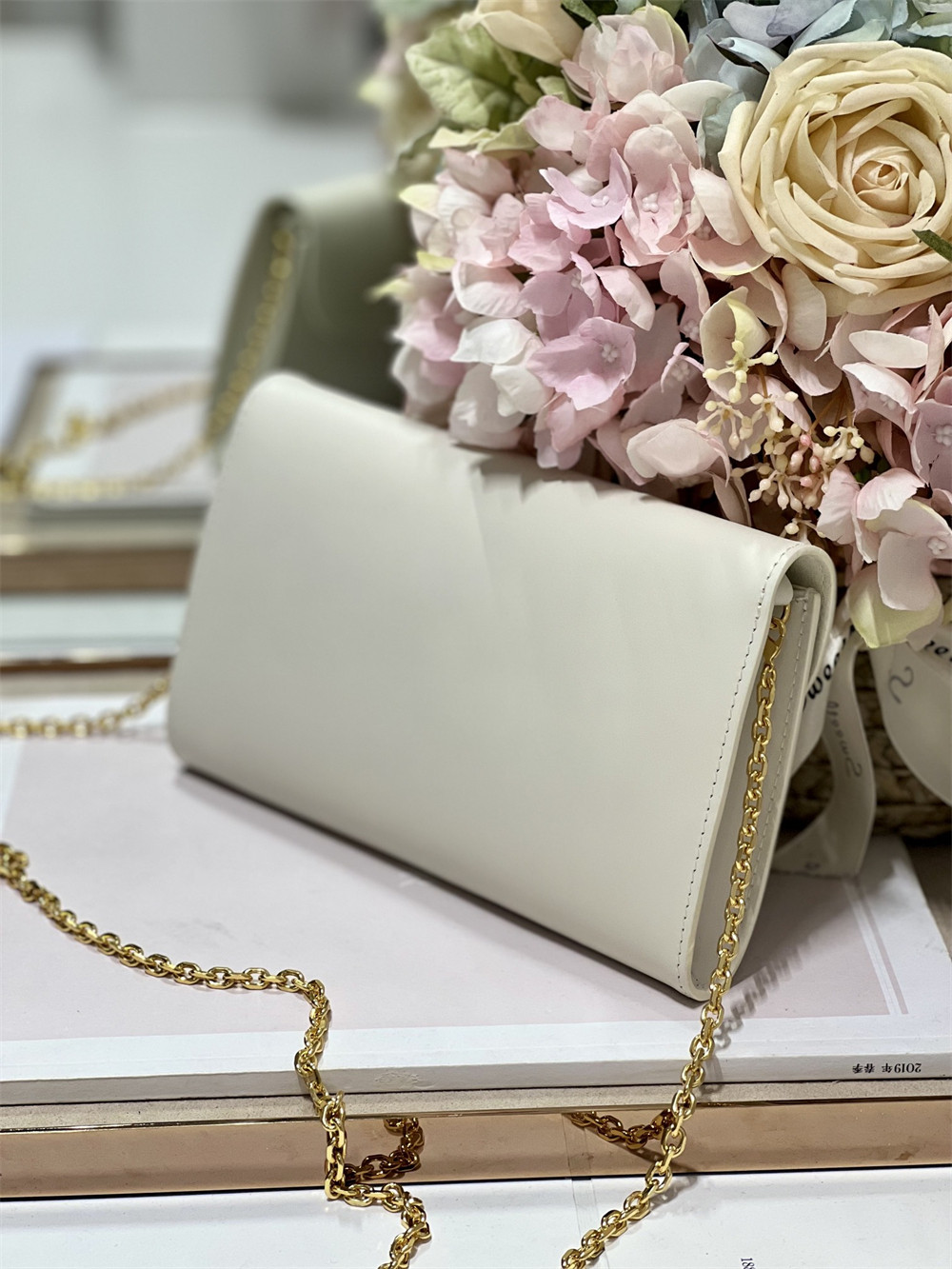 D*or bobby east-west pouch with chain latte smooth calfskin white