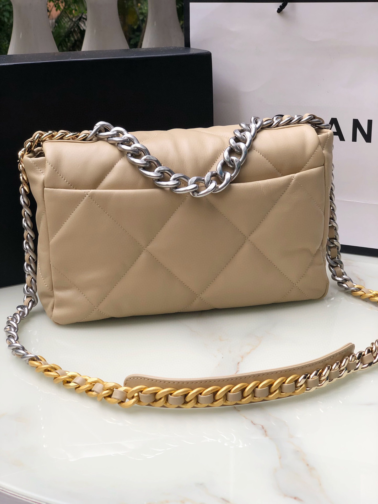 Ch*el 19 handbag shiny leather, gold-tone, silver-tone & ruthenium-finish metal beige 30x20x10cm