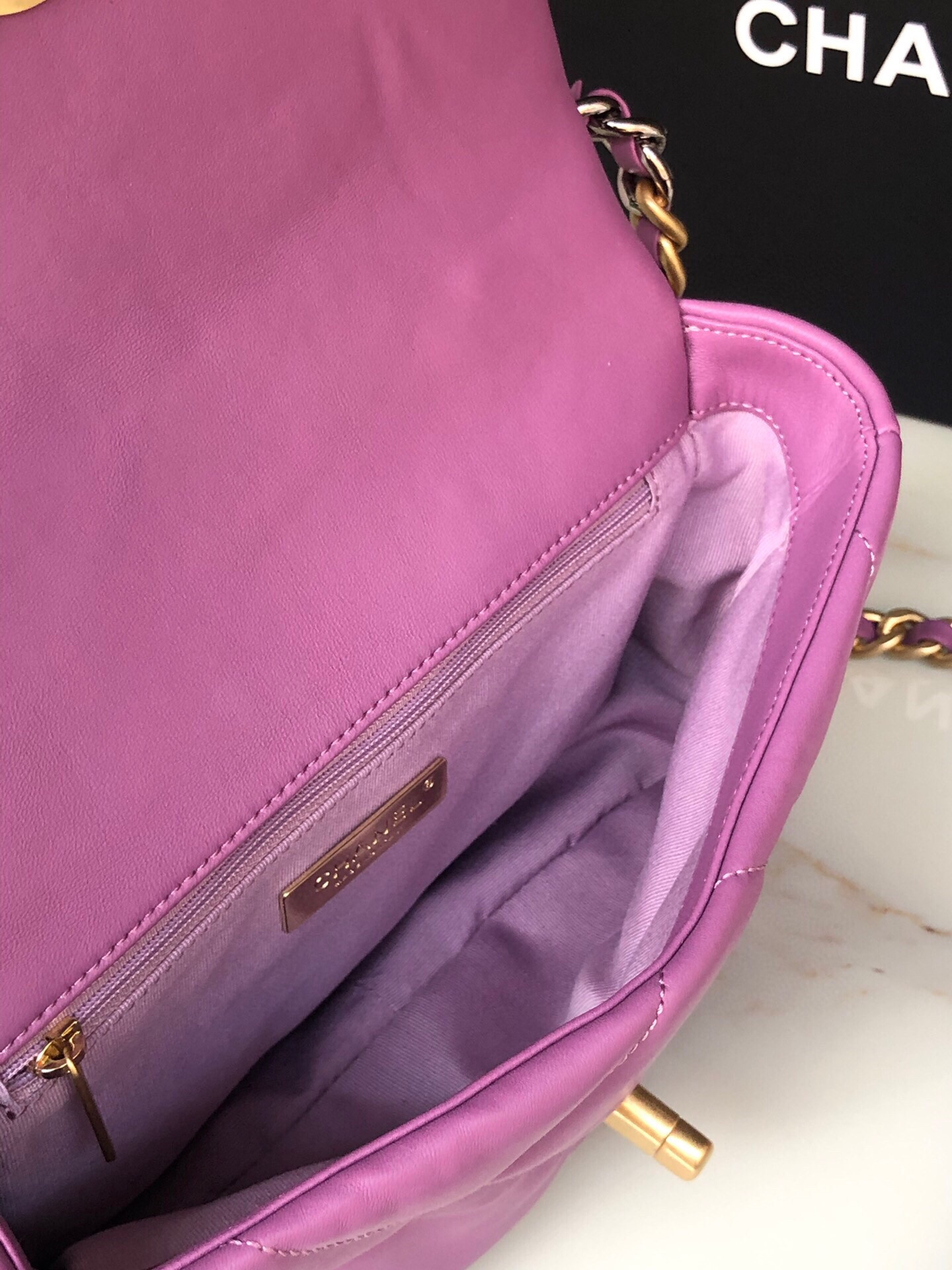 Ch*el 19 handbag shiny leather, gold-tone, silver-tone & ruthenium-finish metal purple 6.2 × 10.1 × 3.5 in
