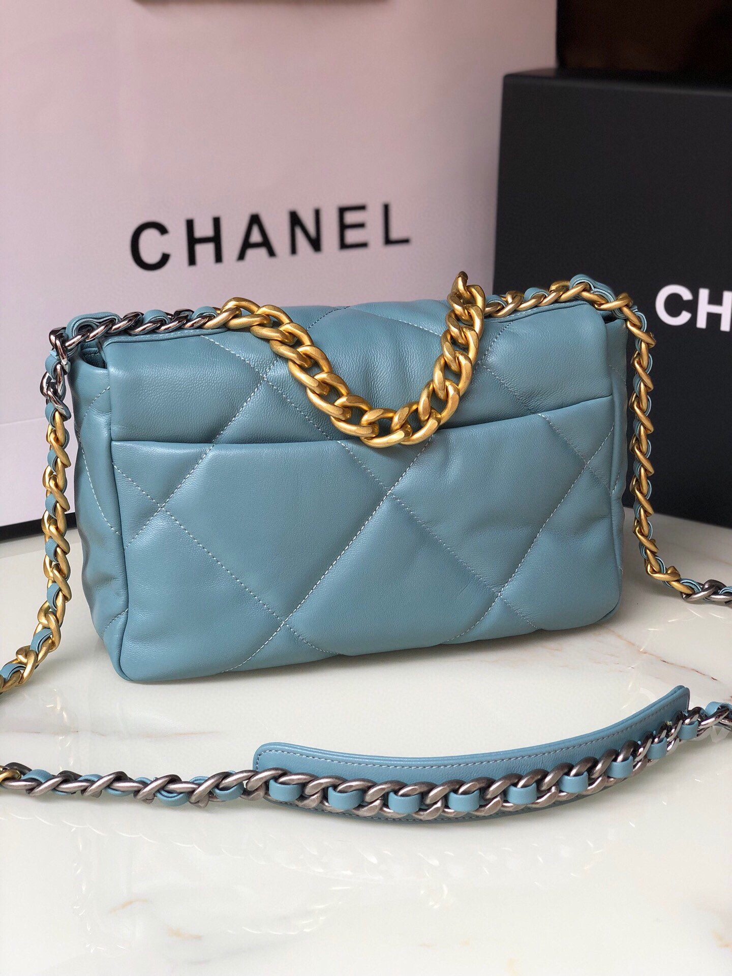 Ch*el 19 handbag shiny leather, gold-tone, silver-tone & ruthenium-finish metal blue 6.2 × 10.1 × 3.5 in