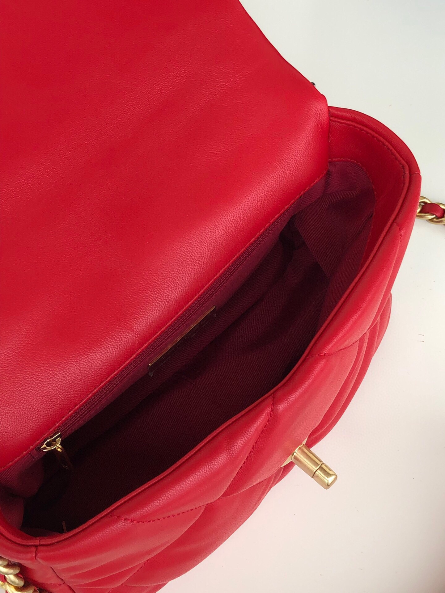 Ch*el 19 handbag shiny leather, gold-tone, silver-tone & ruthenium-finish metal red 6.2 × 10.1 × 3.5 in