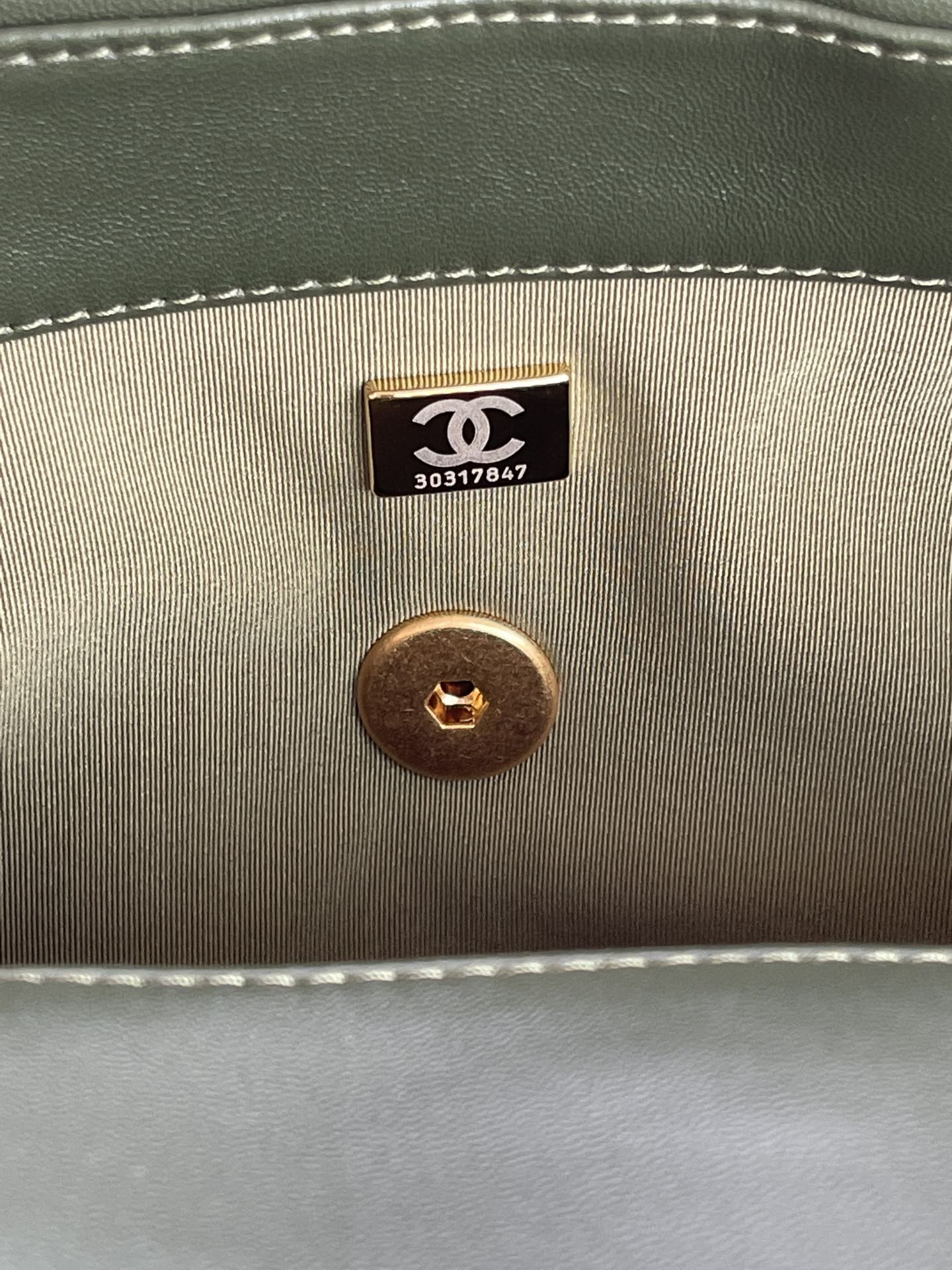 Ch*el 19 large handbag shiny leather, gold-tone, silver-tone & ruthenium-finish metal dark green 7.8 × 11.7 × 3.9 in