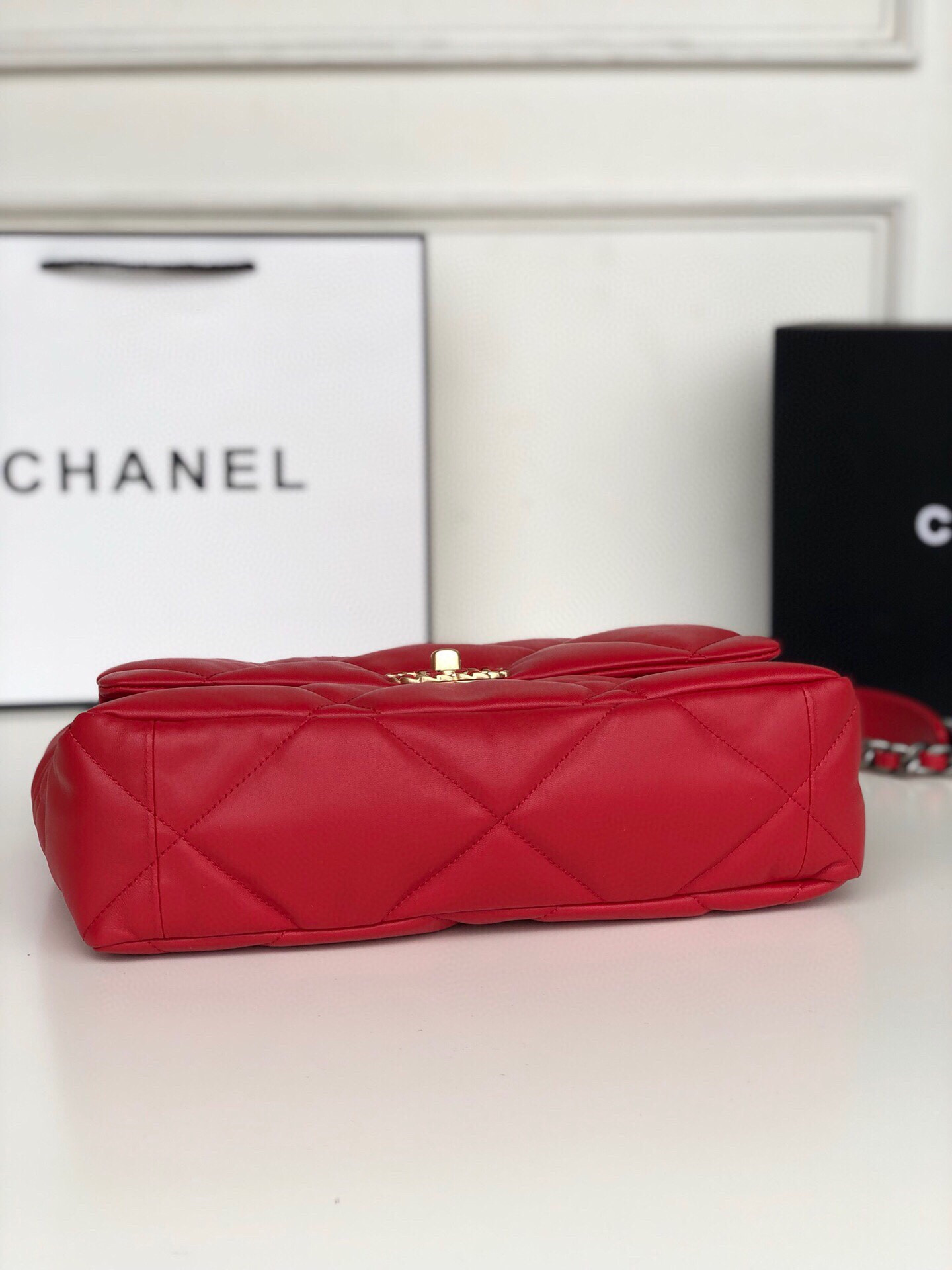 Ch*el 19 large handbag shiny leather, gold-tone, silver-tone & ruthenium-finish metal red 7.8 × 11.7 × 3.9 in