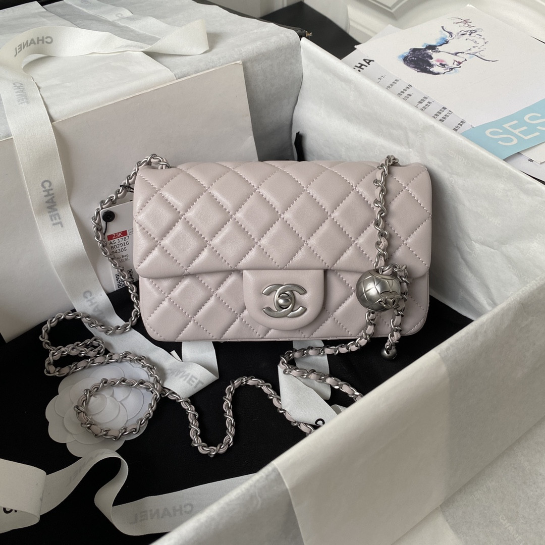 Ch*el mini flap bag shiny calfskin & silver-tone metal light pink 4.7 × 7.8 × 2.3 in