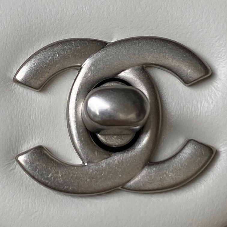 Ch*el mini flap bag shiny calfskin & silver-tone metal white 5.3 × 6.6 × 3.1 in
