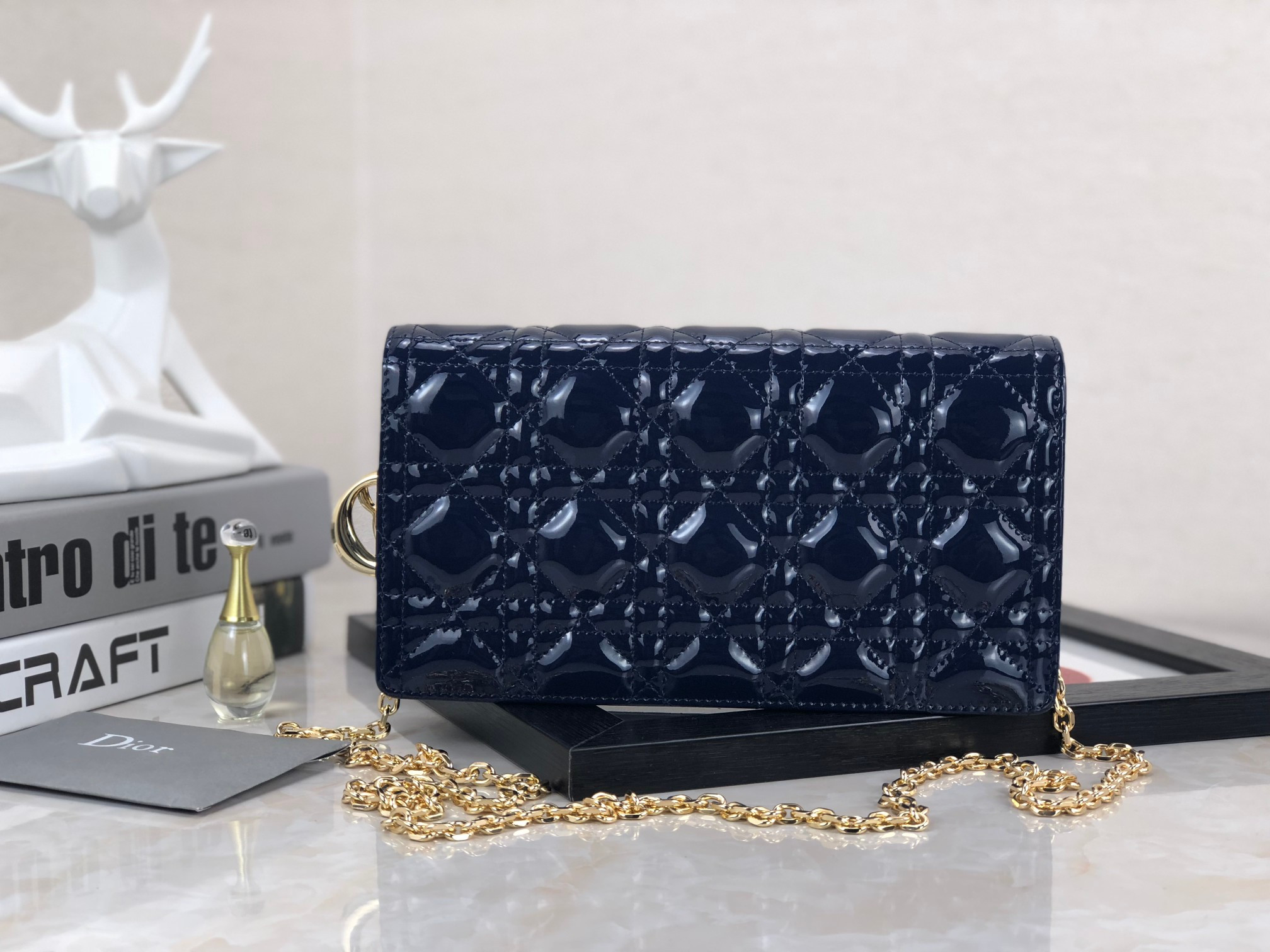 lady D*or pouch navy patent cannage calfskin 8.5 x 4.5 x 1 inches