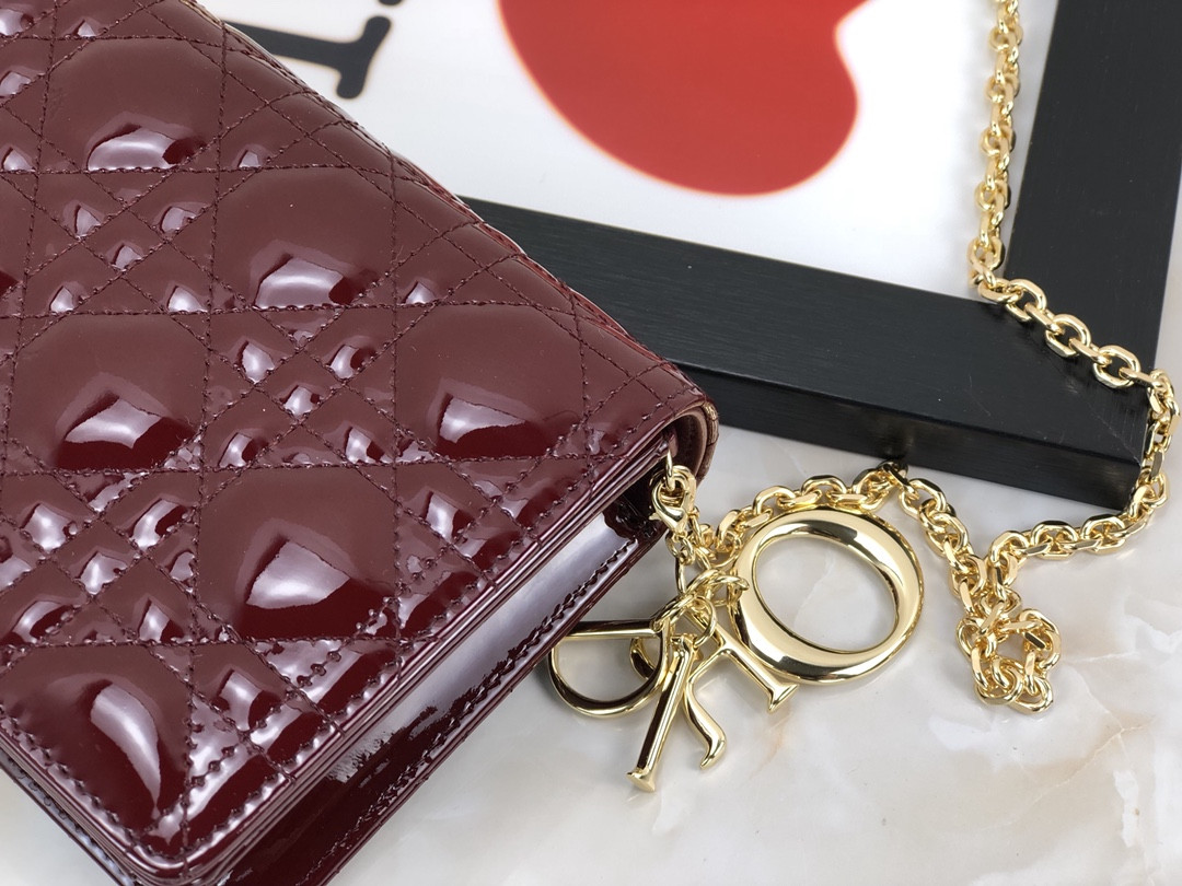 lady D*or pouch red patent cannage calfskin 8.5 x 4.5 x 1 inches