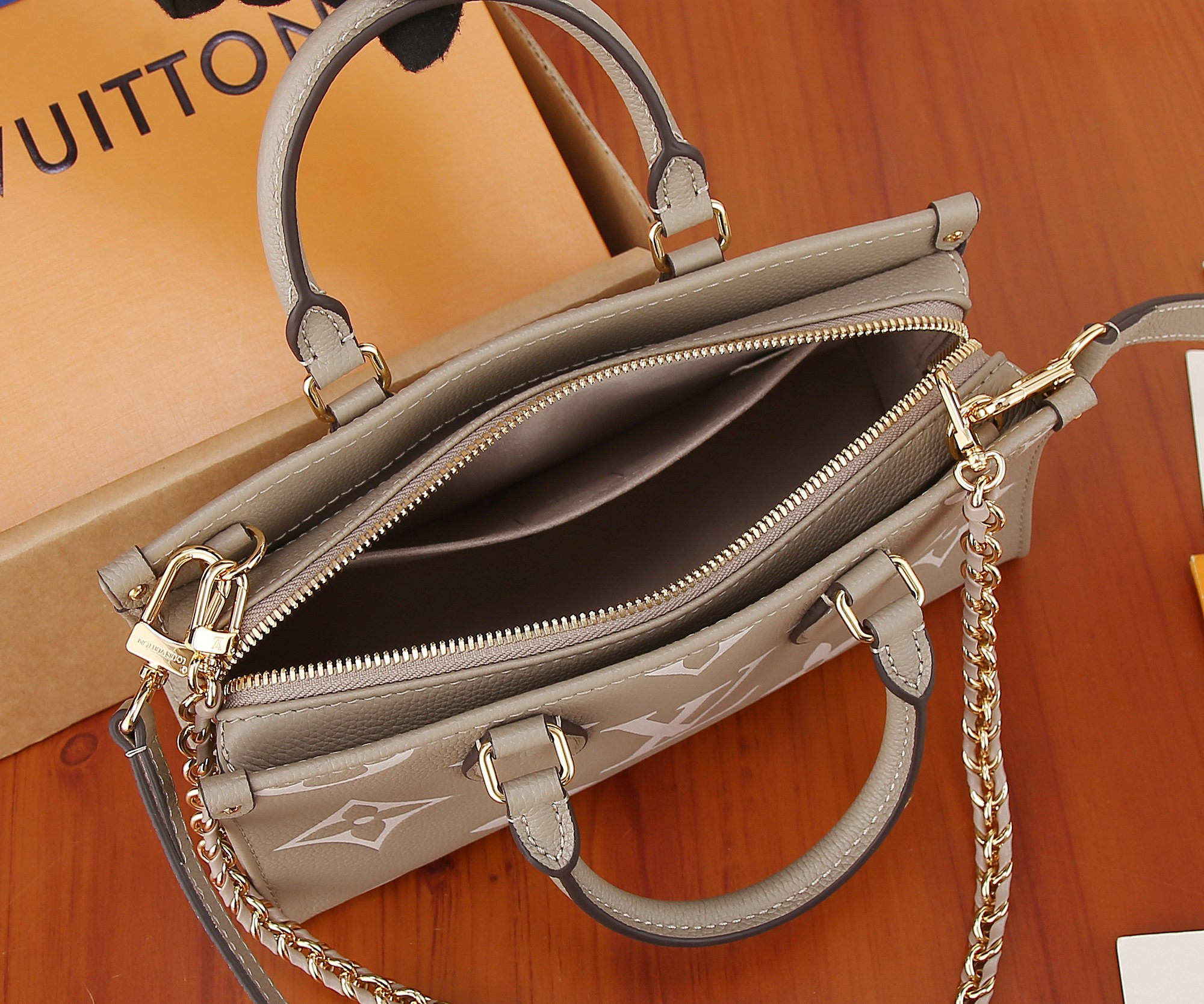 LV OnTheGo East West M23641 9.8 x 5.1 x 3.9 inches