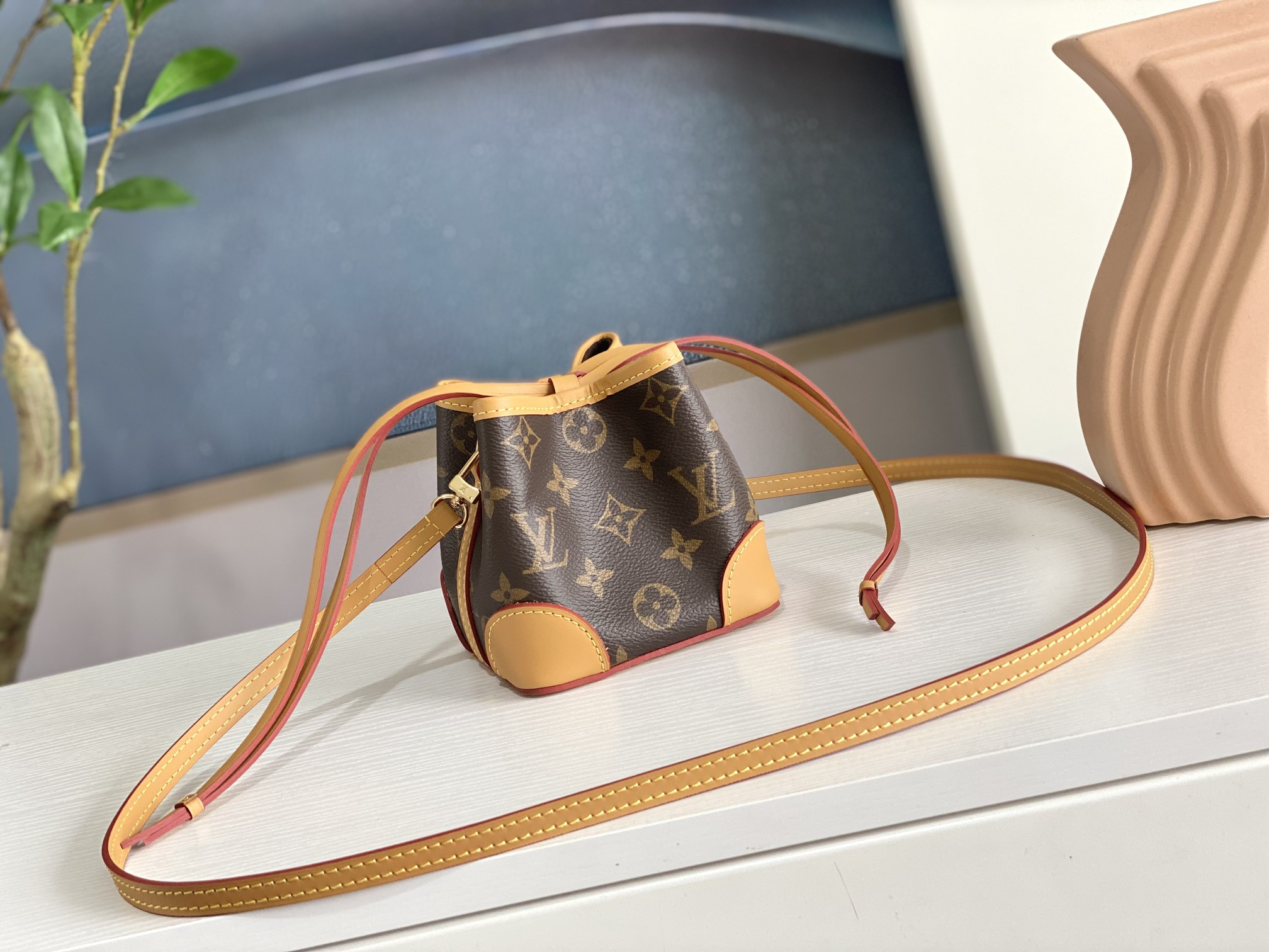 LV M57099 NOE PURSE 4.5 x 4.7 x 4.5 inches