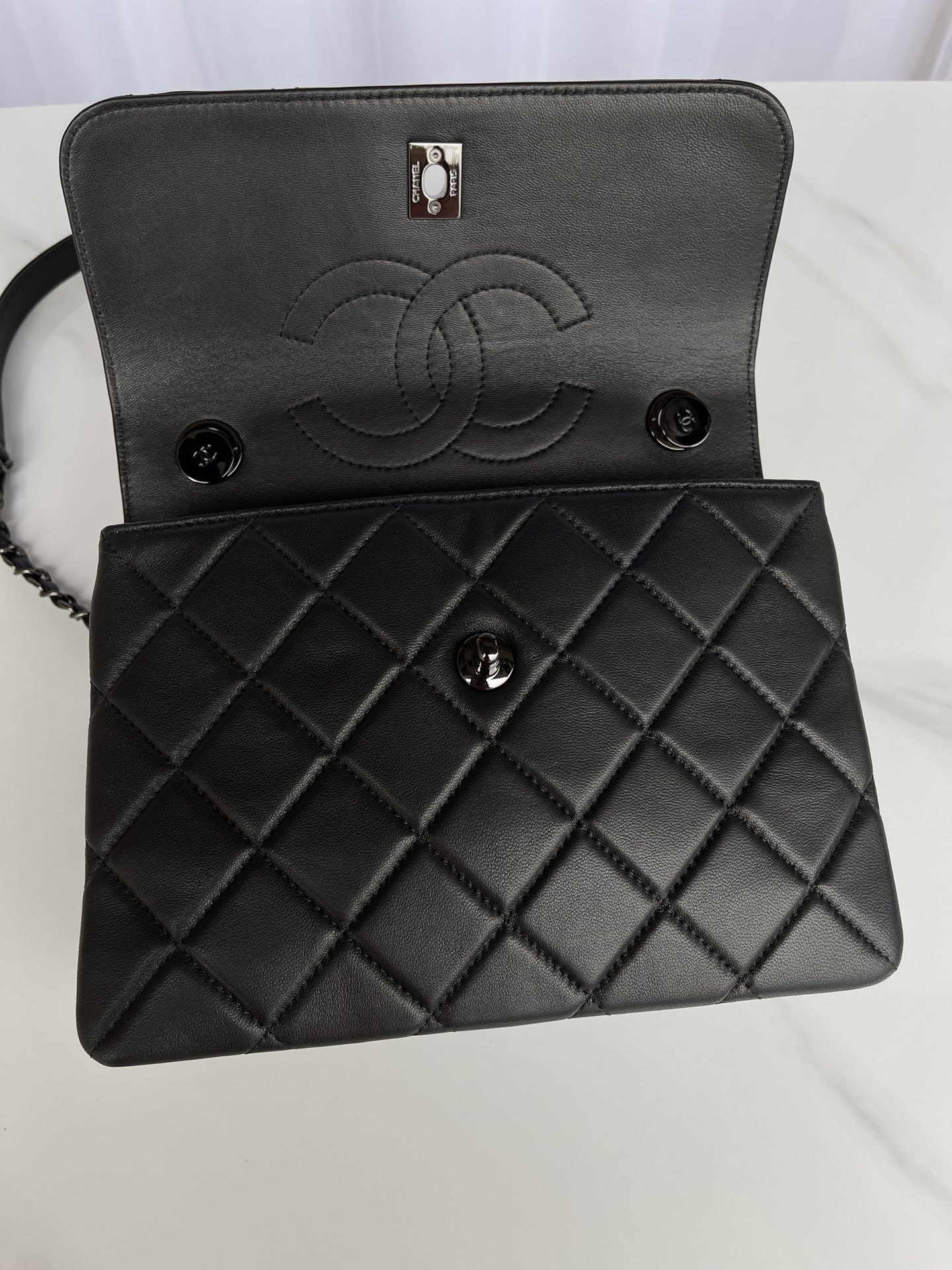 Ch*el flap bag with top handle black 6.6 × 9.8 × 4.7 in