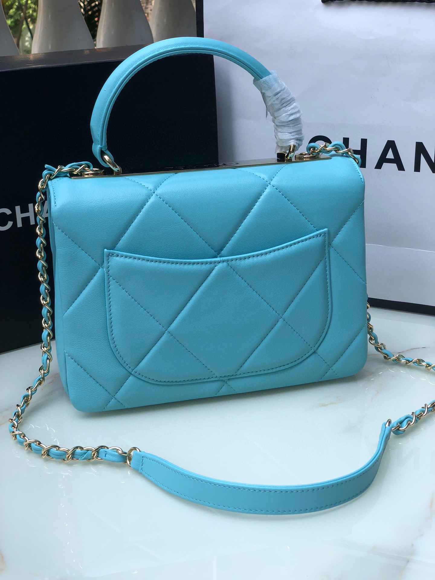 Ch*el flap bag with top handle 6.6 × 9.8 × 4.7 in