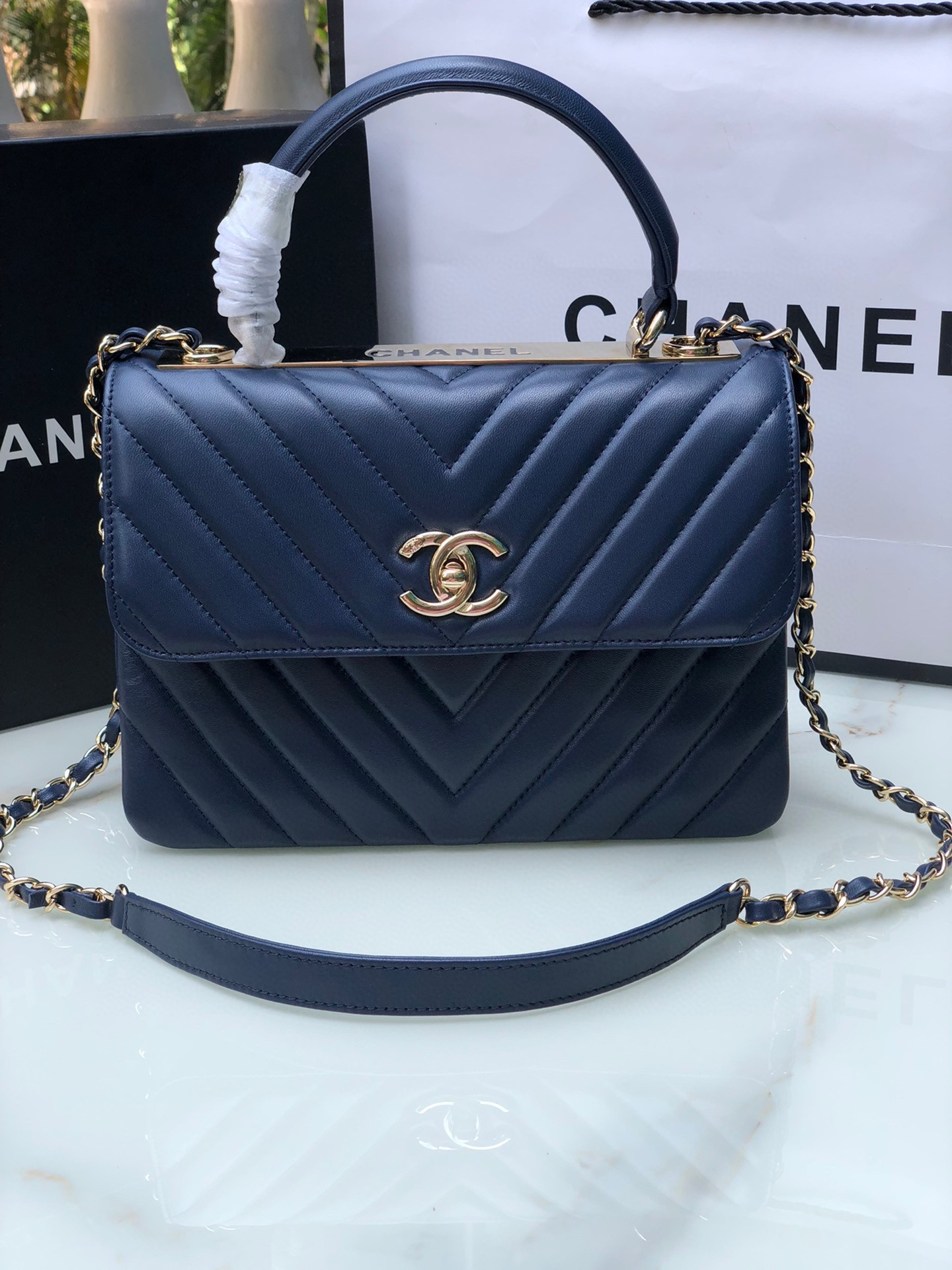 Ch*el flap bag with top handle navy 6.6 × 9.8 × 4.7 in