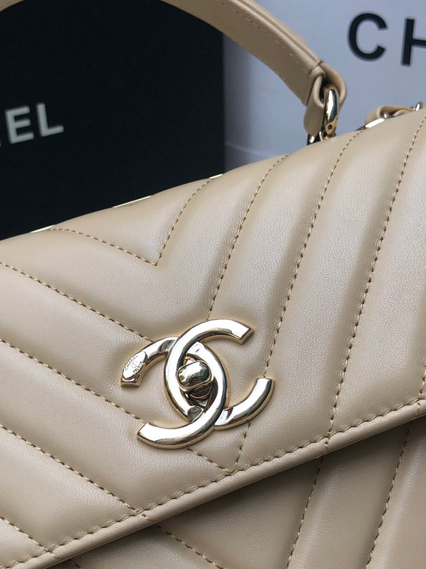 Ch*el flap bag with top handle beige 6.6 × 9.8 × 4.7 in