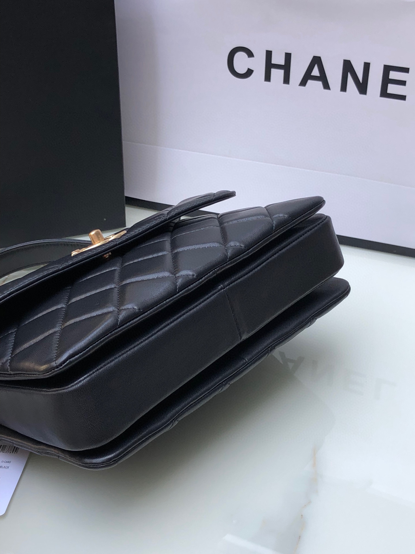 Ch*el flap bag with top handle 6.6 × 9.8 × 4.7 in