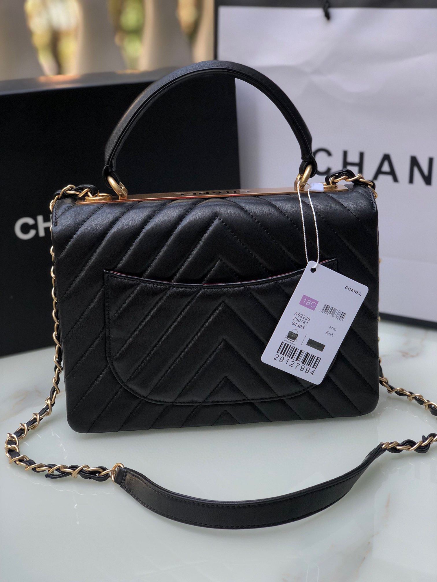 Ch*el flap bag with top handle 6.6 × 9.8 × 4.7 in
