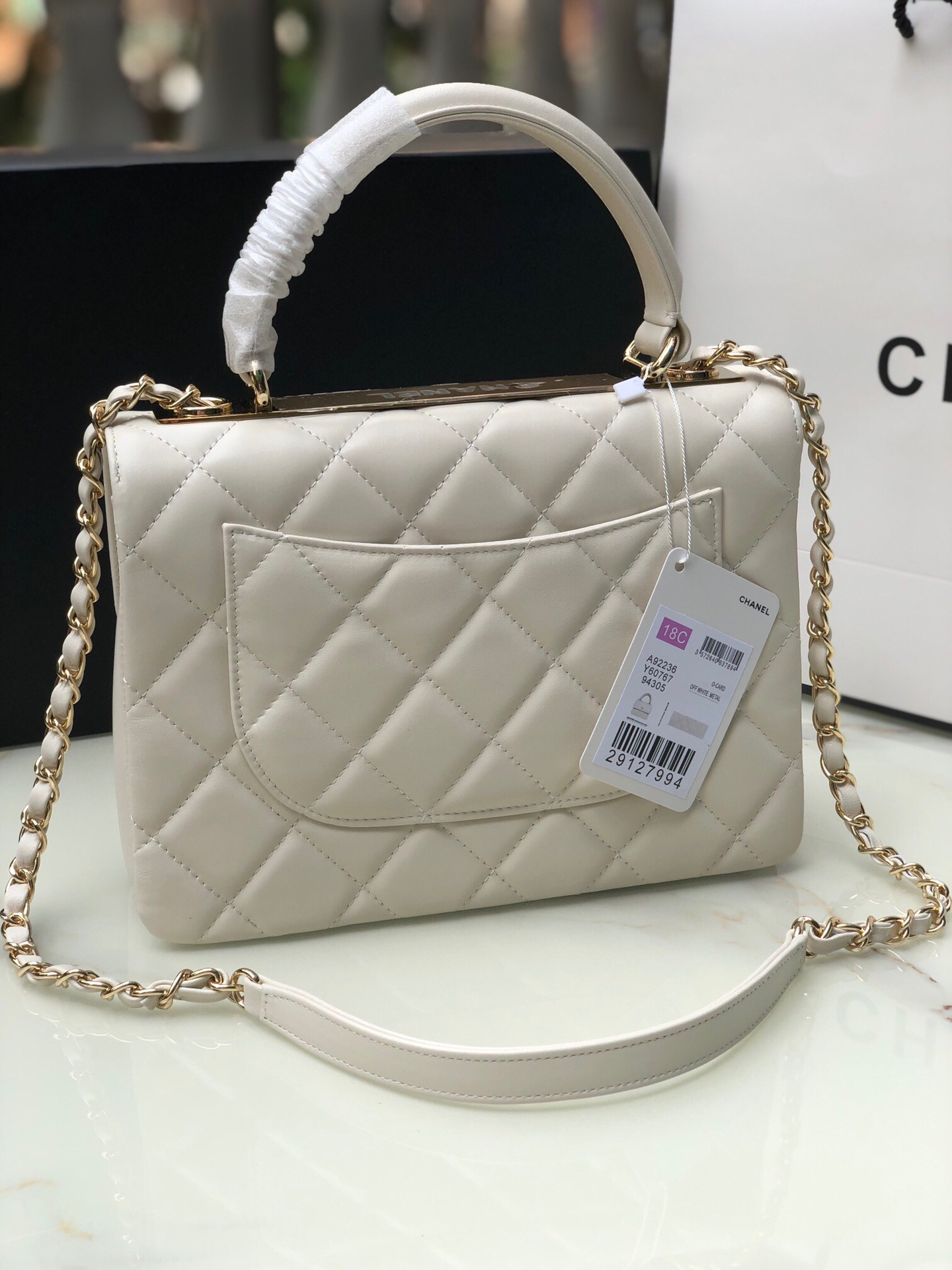 Ch*el flap bag with top handle 6.6 × 9.8 × 4.7 in