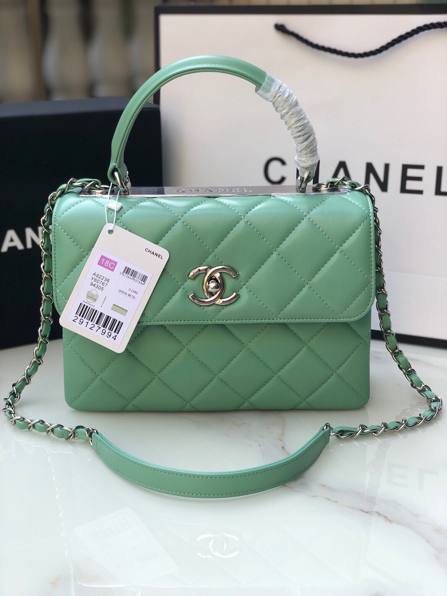 Ch*el flap bag with top handle 6.6 × 9.8 × 4.7 in