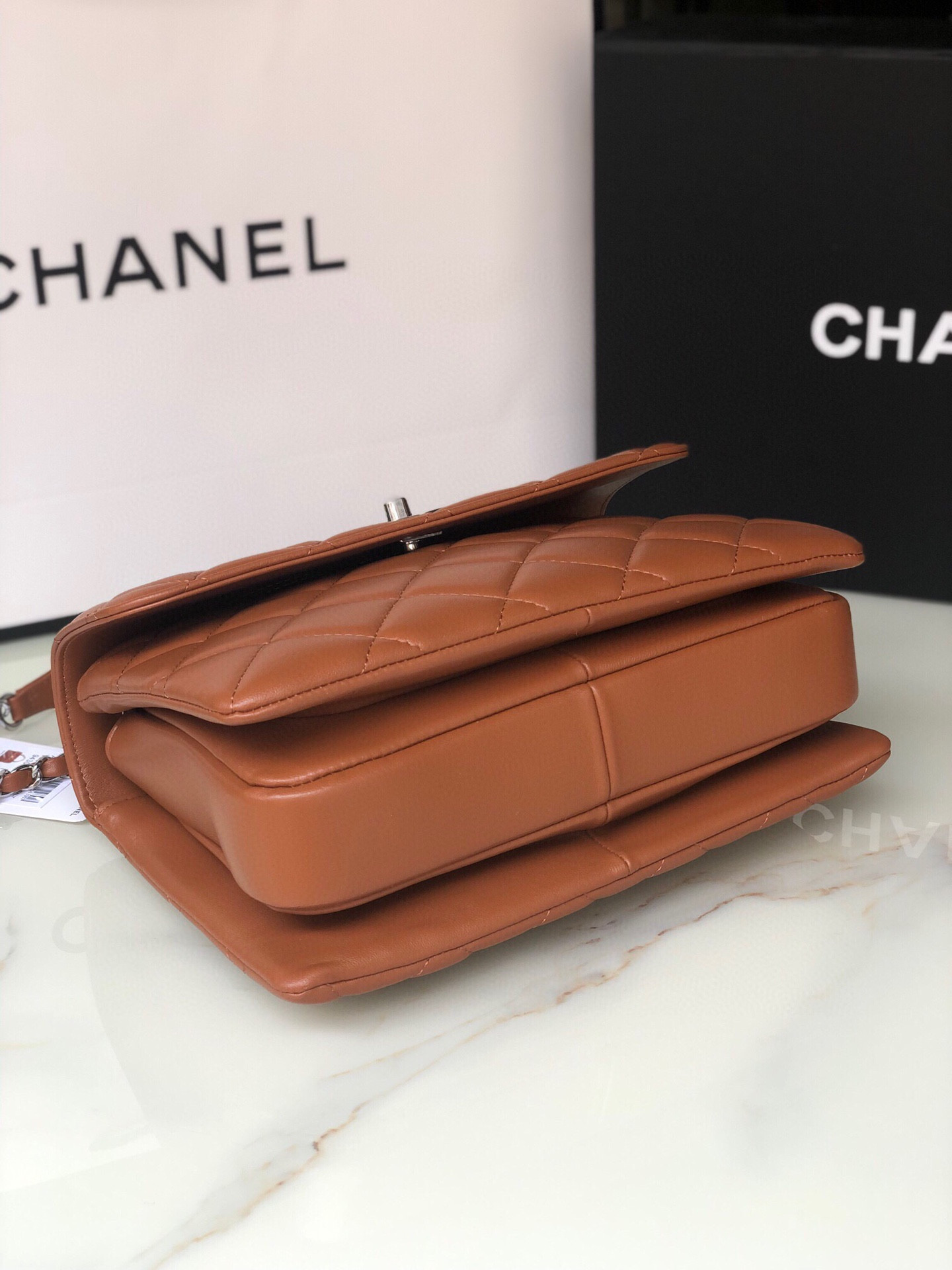 Ch*el flap bag with top handle 6.6 × 9.8 × 4.7 in