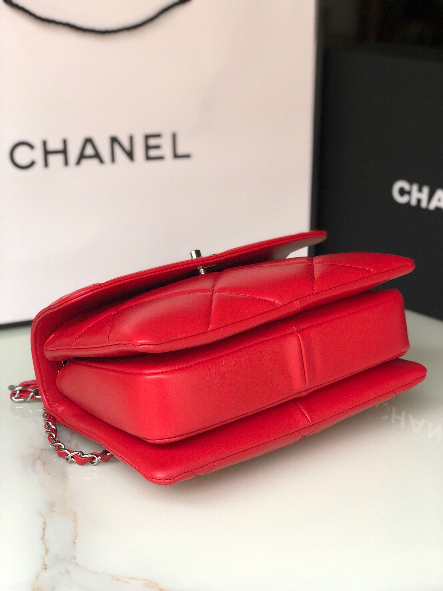 Ch*el flap bag with top handle 6.6 × 9.8 × 4.7 in