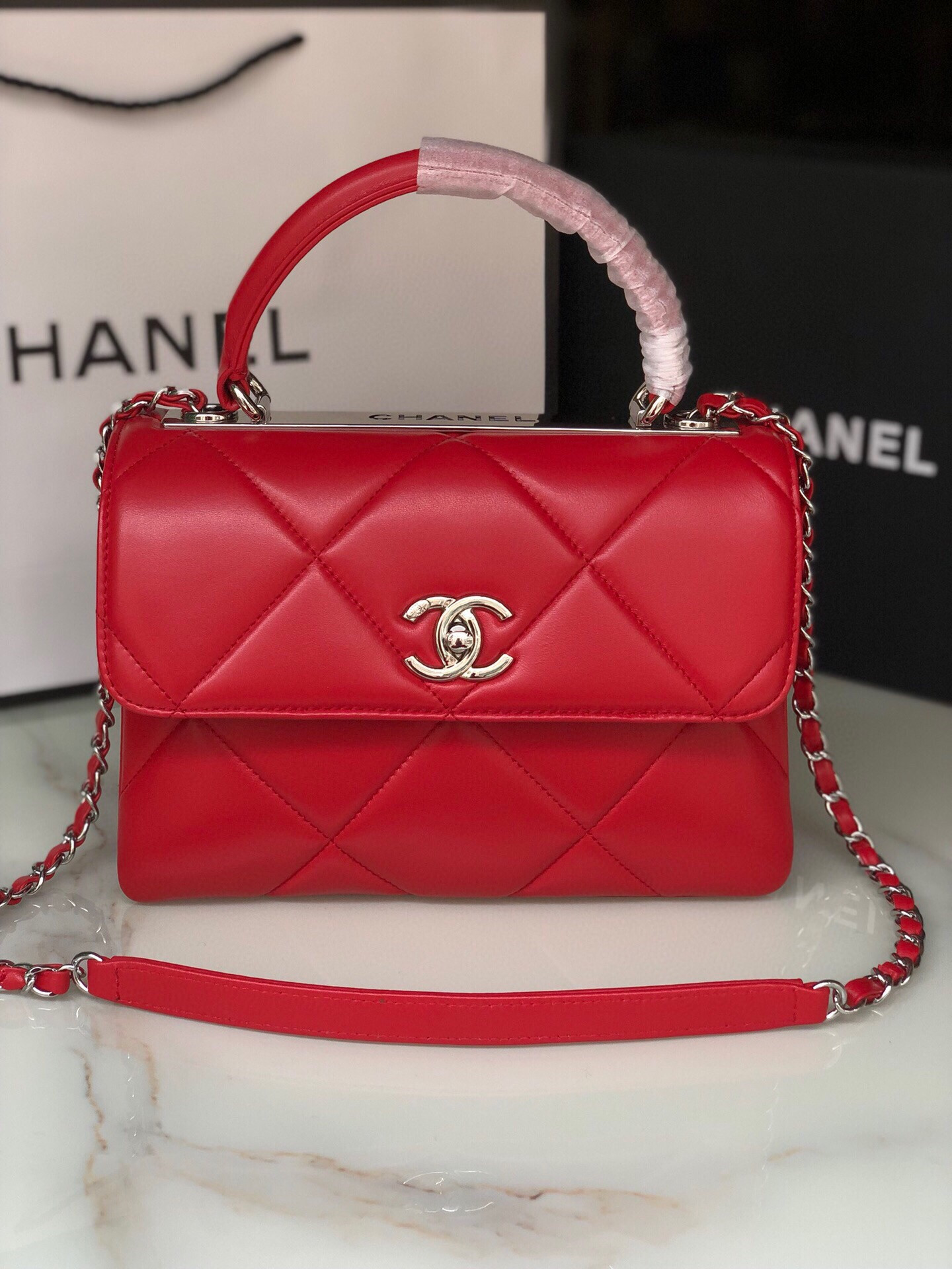 Ch*el flap bag with top handle 6.6 × 9.8 × 4.7 in