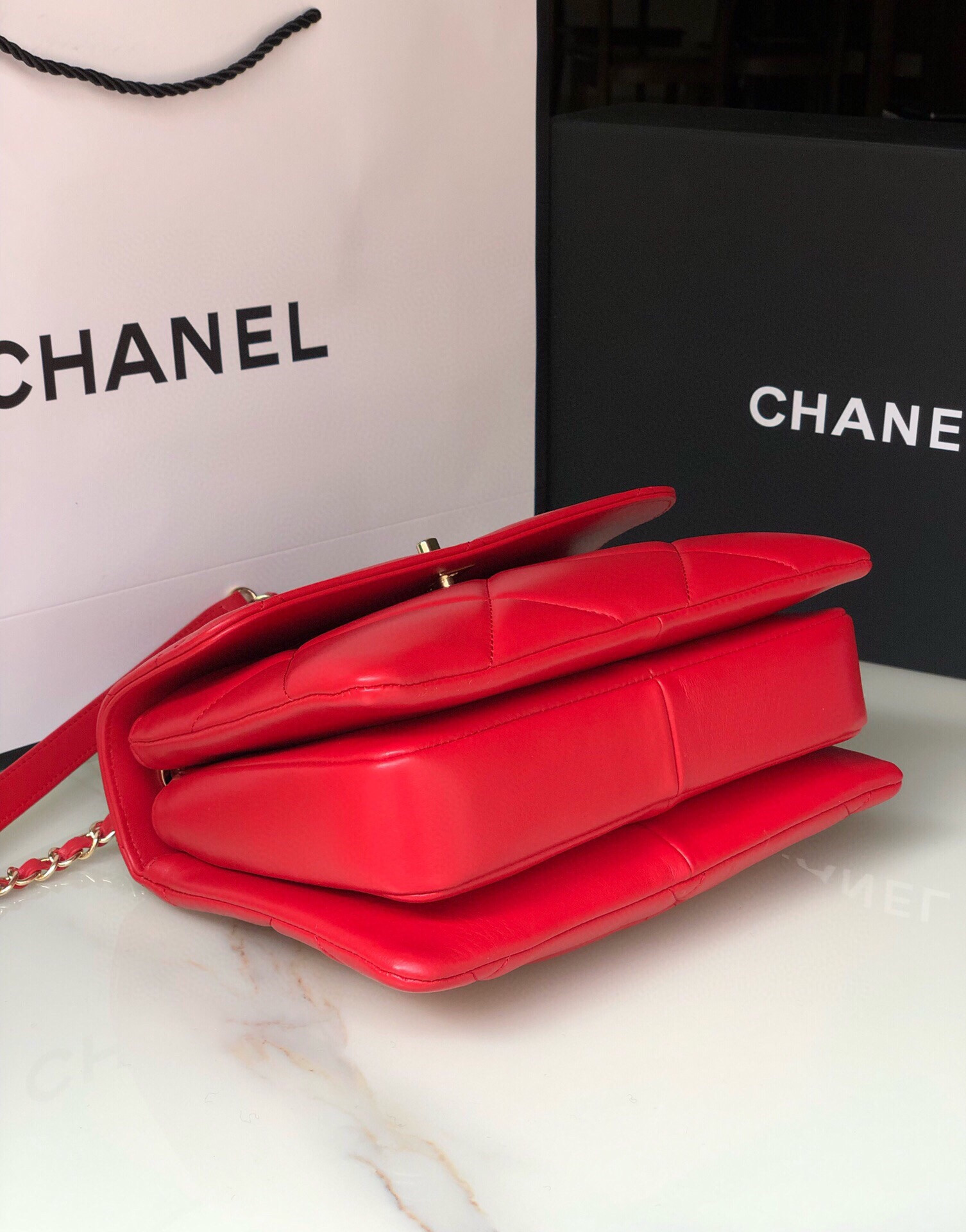 Ch*el flap bag with top handle 6.6 × 9.8 × 4.7 in